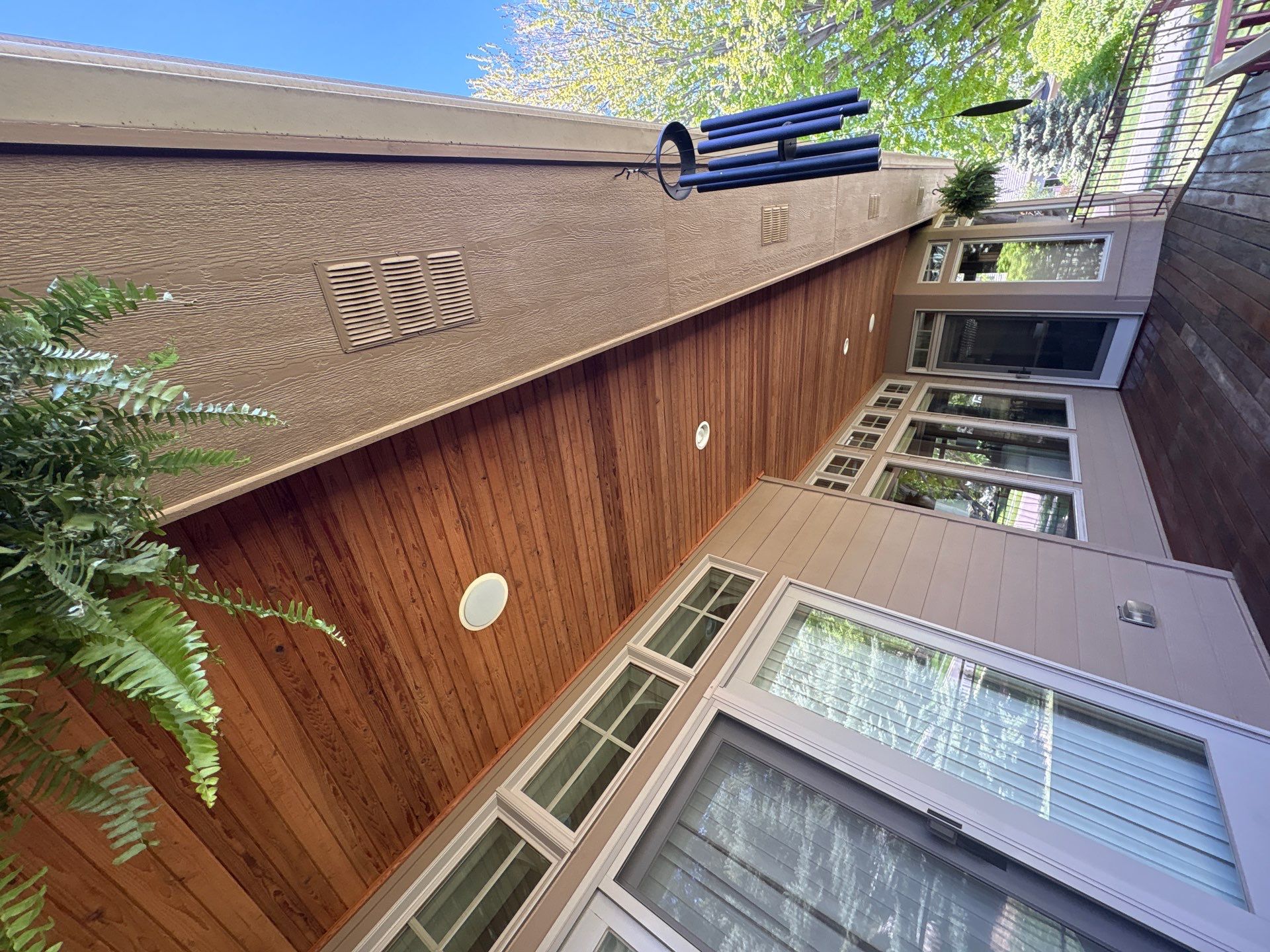 Deck Staining and Tongue and Groove Ceiling Refinish in Sioux Falls by Select Painting, Coatings & Garage Cabinets