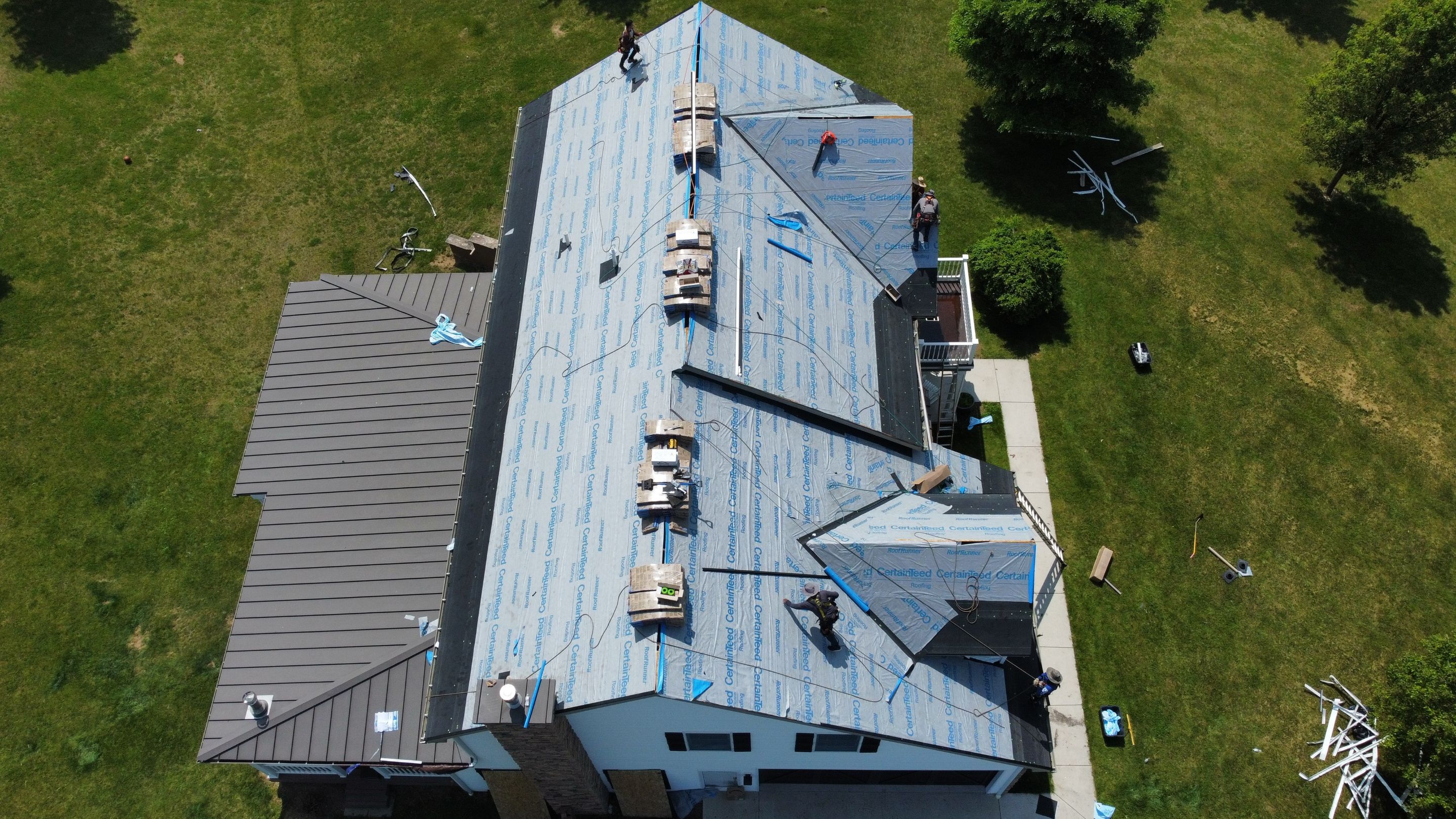 Roof Damage using Certainteed Lifetime Roofing System- Moire Black Landmark Pro shingkes with shadow ridge caps. by BulletpROOF Exteriors