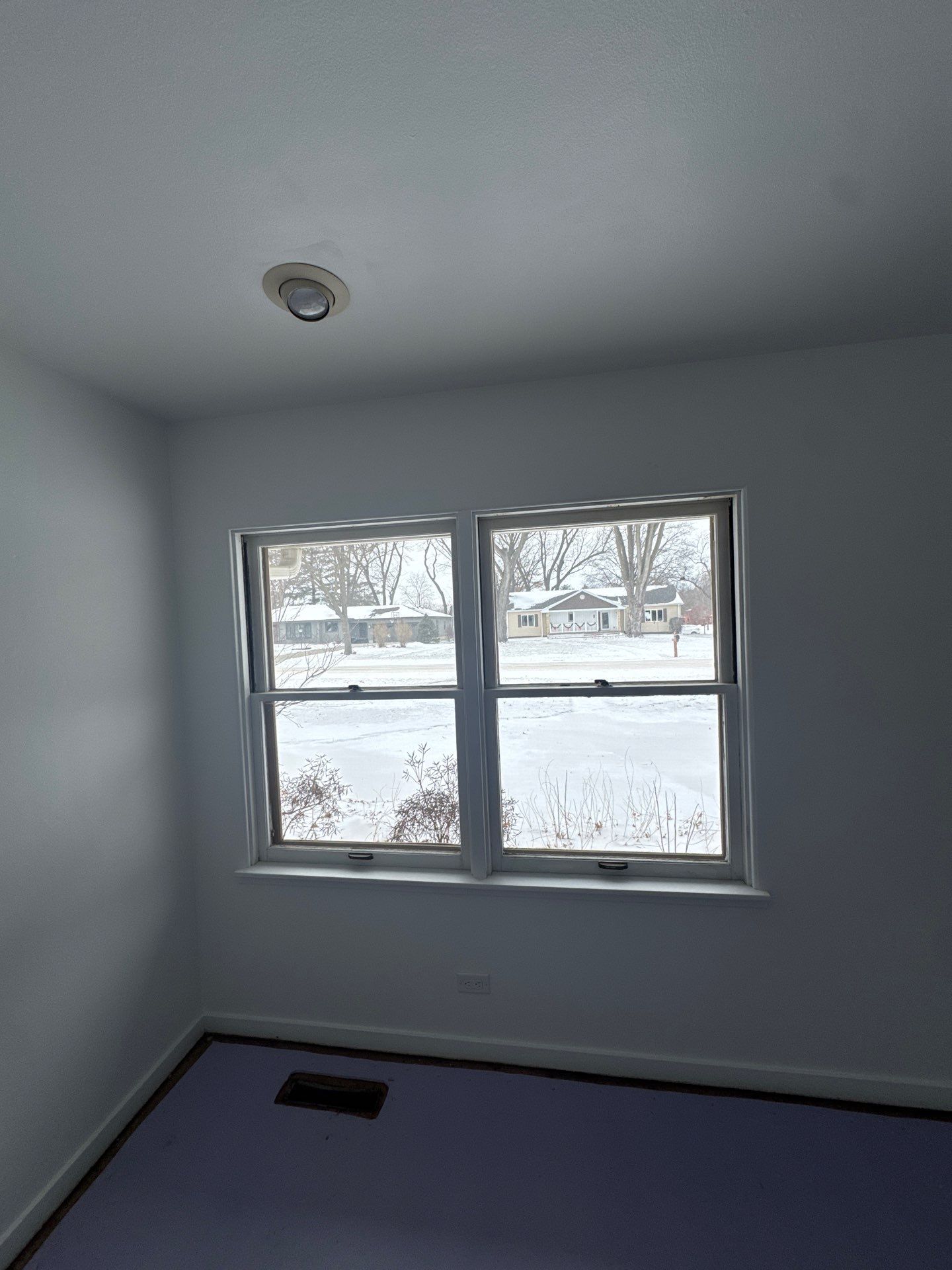 Black-Frame Pella Lifestyle Upgrade on a Partial Brick Home by United Windows and Siding LLC