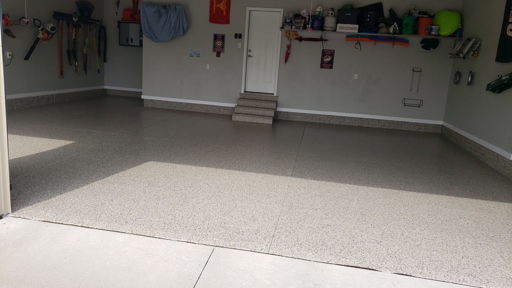 Grimes, IA Transformation: Professional Grade Garage Floor Coating by Revival Concrete Coatings