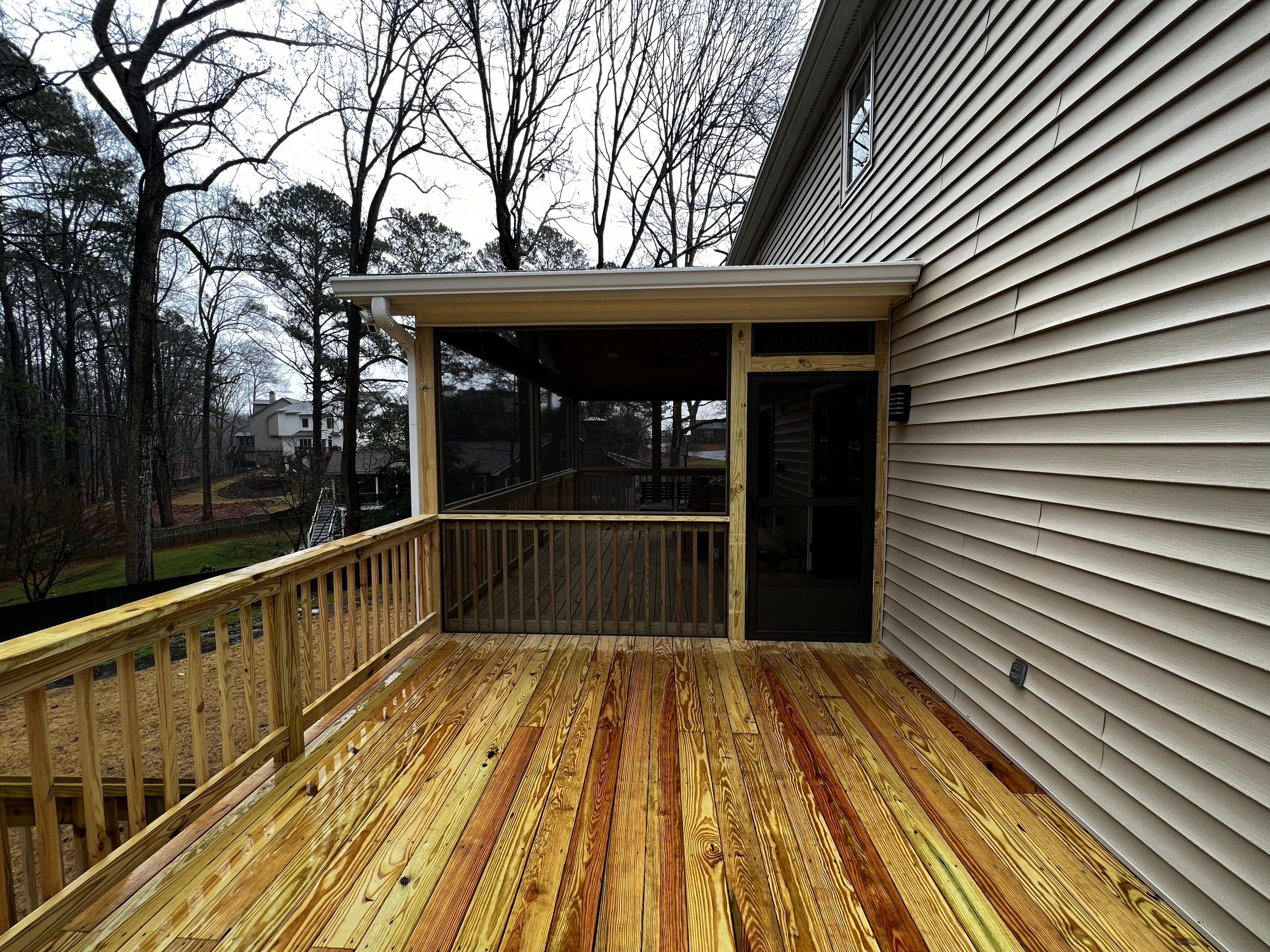 Custom Screened-In Porch and Elevated Deck Construction in Smyrna by Swift Home Renovations