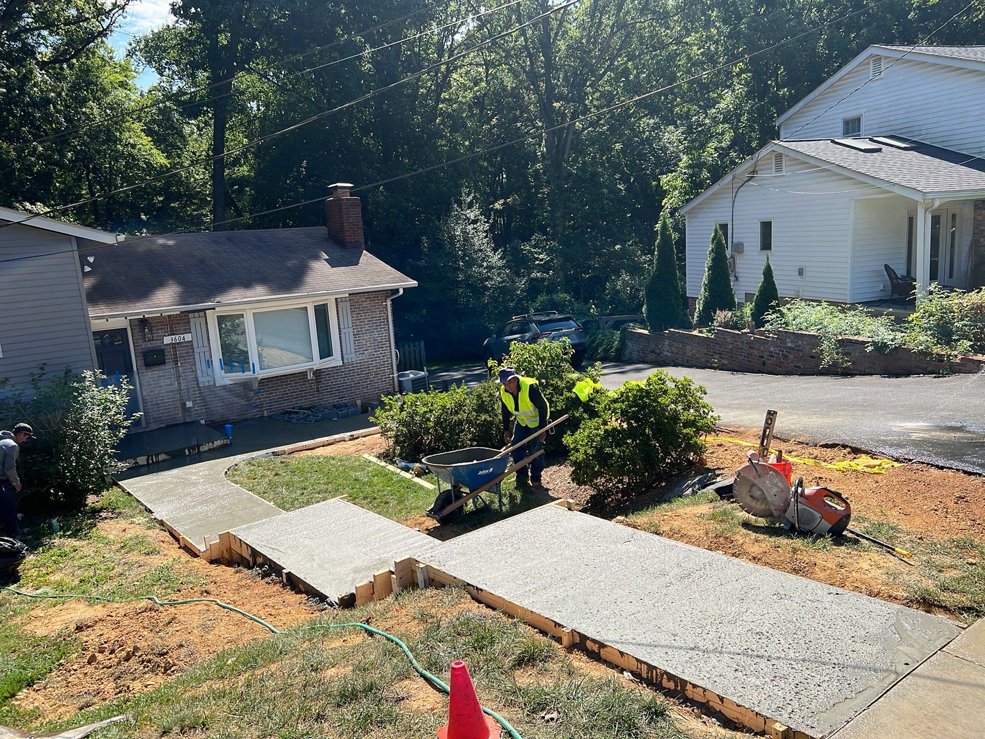 New walkway with stairs and a new front porch by Fairfax Contractors, LLC