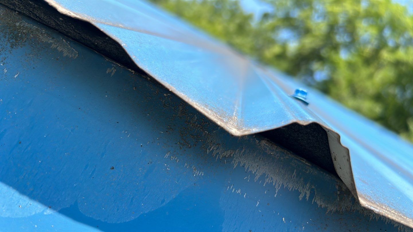 Residential Roofing Installation using Standing Seam Metal - Gallery Blue by RoofX 
