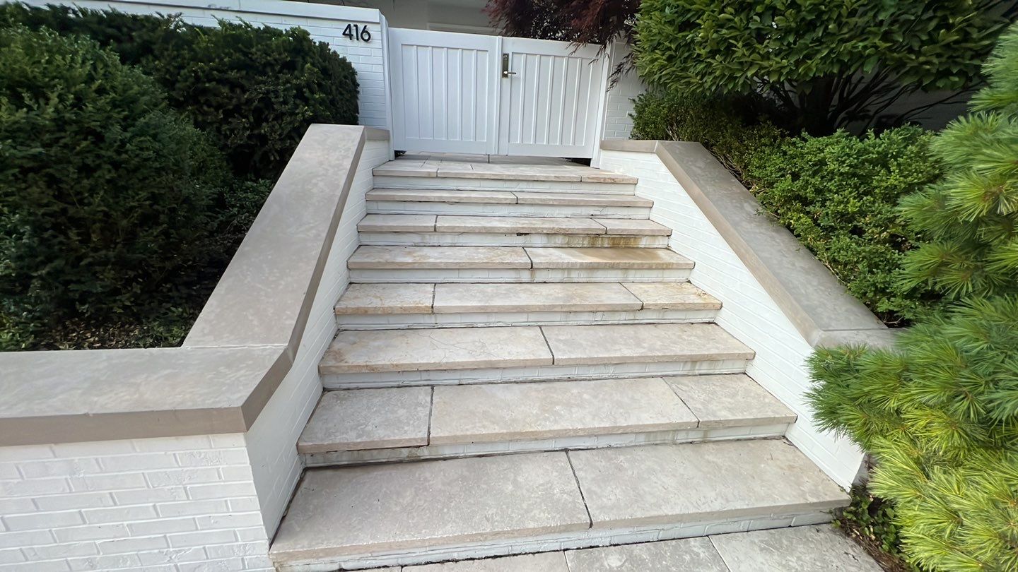 marble patio cleaning and sanding using Polysweep polymeric sand by Northern Power Washing LLC.