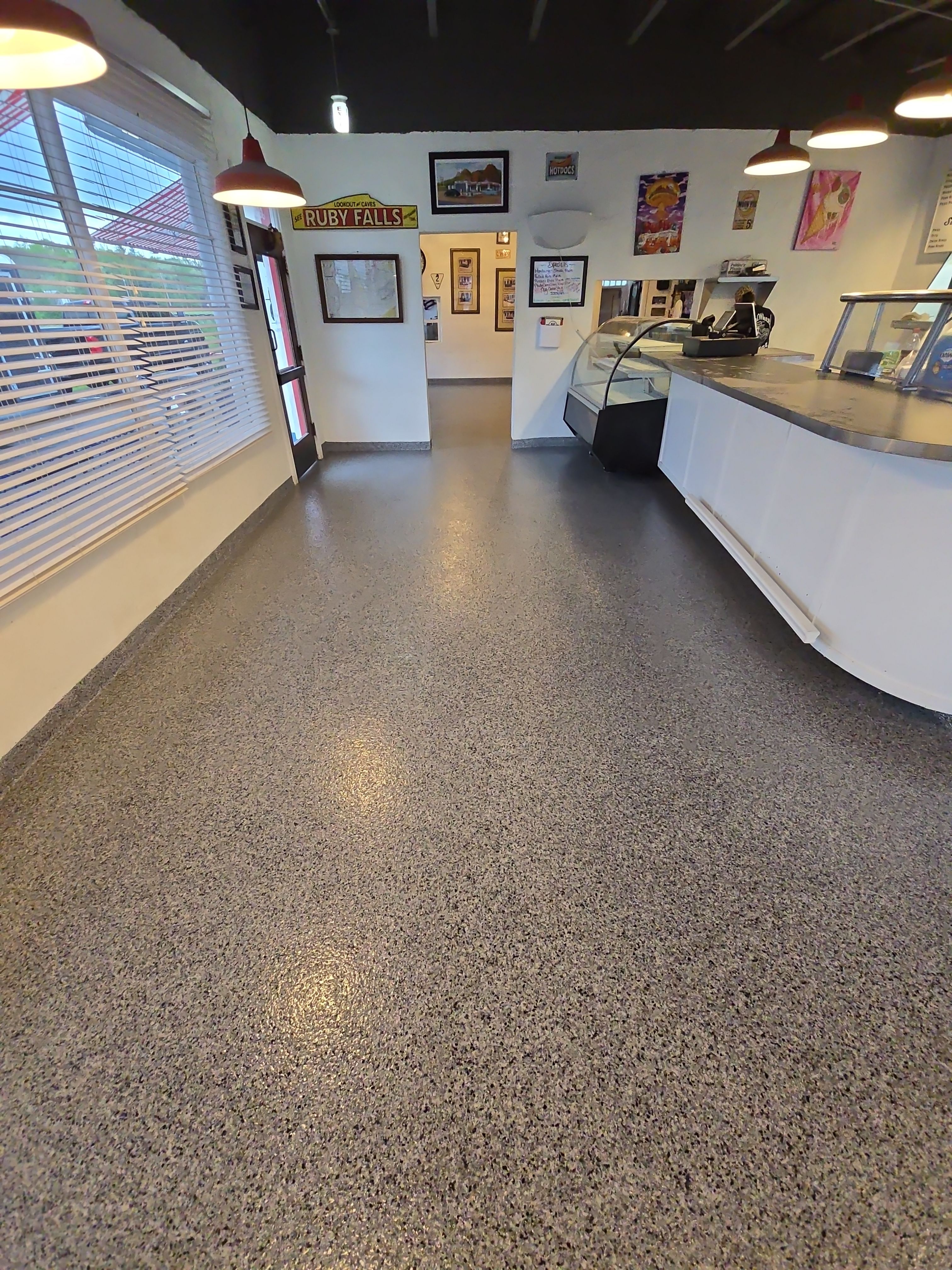 Check it out! Steelwheel Corner gets a new floor! by Elite Floor Solutions