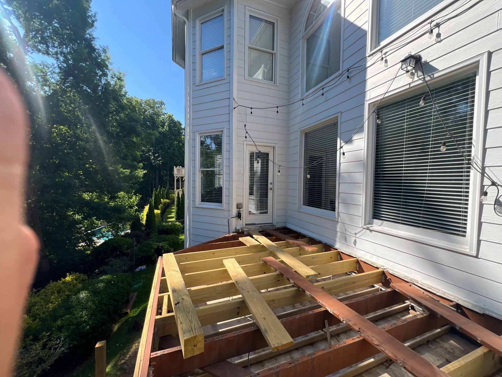 Elevated Composite Deck and Concrete Landing Installation in Kennesaw by Swift Home Renovations