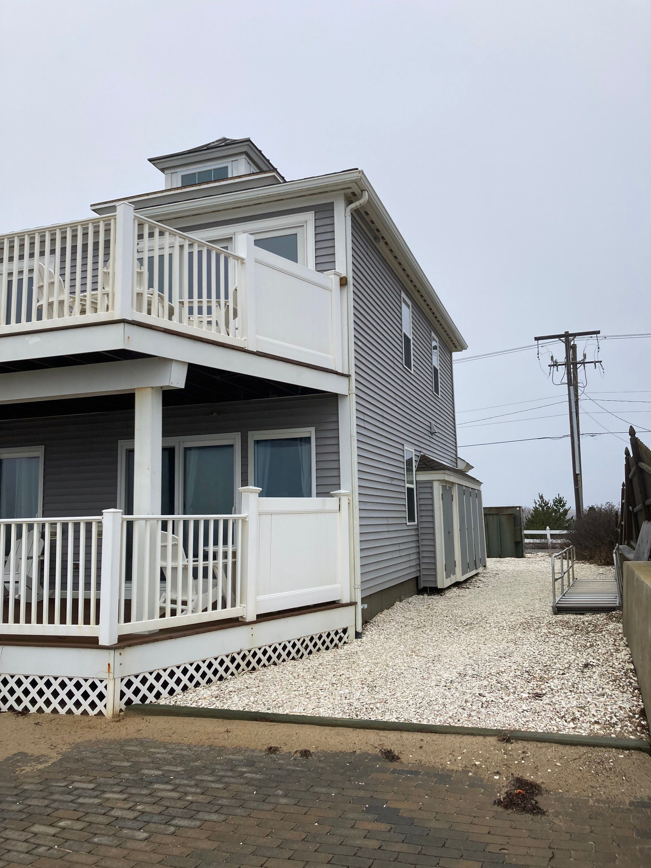 Gutter Installation using 6" K-Style Aluminum Gutter on the Seaside Inn in Truro, MA by Gutter Pro Enterprises