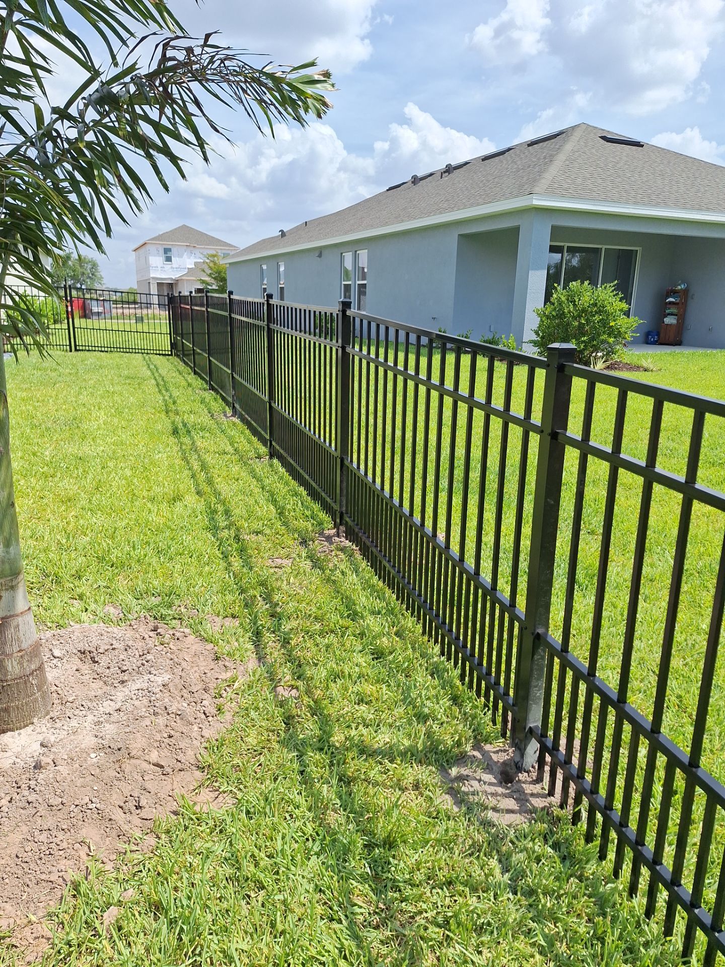 Aluminum Fence Installation using Black 3 Rail Aluminum Fence by Asap fence and gates, LLC