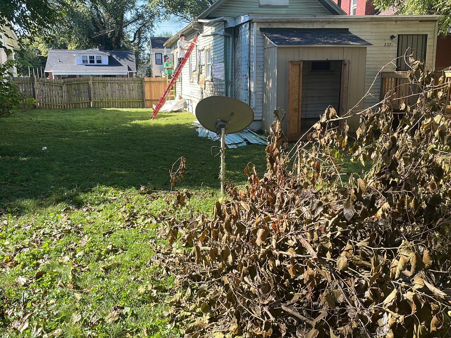 Rental Property Restoration, siding, flooring, gutters, landscaping by Storm Contracting 