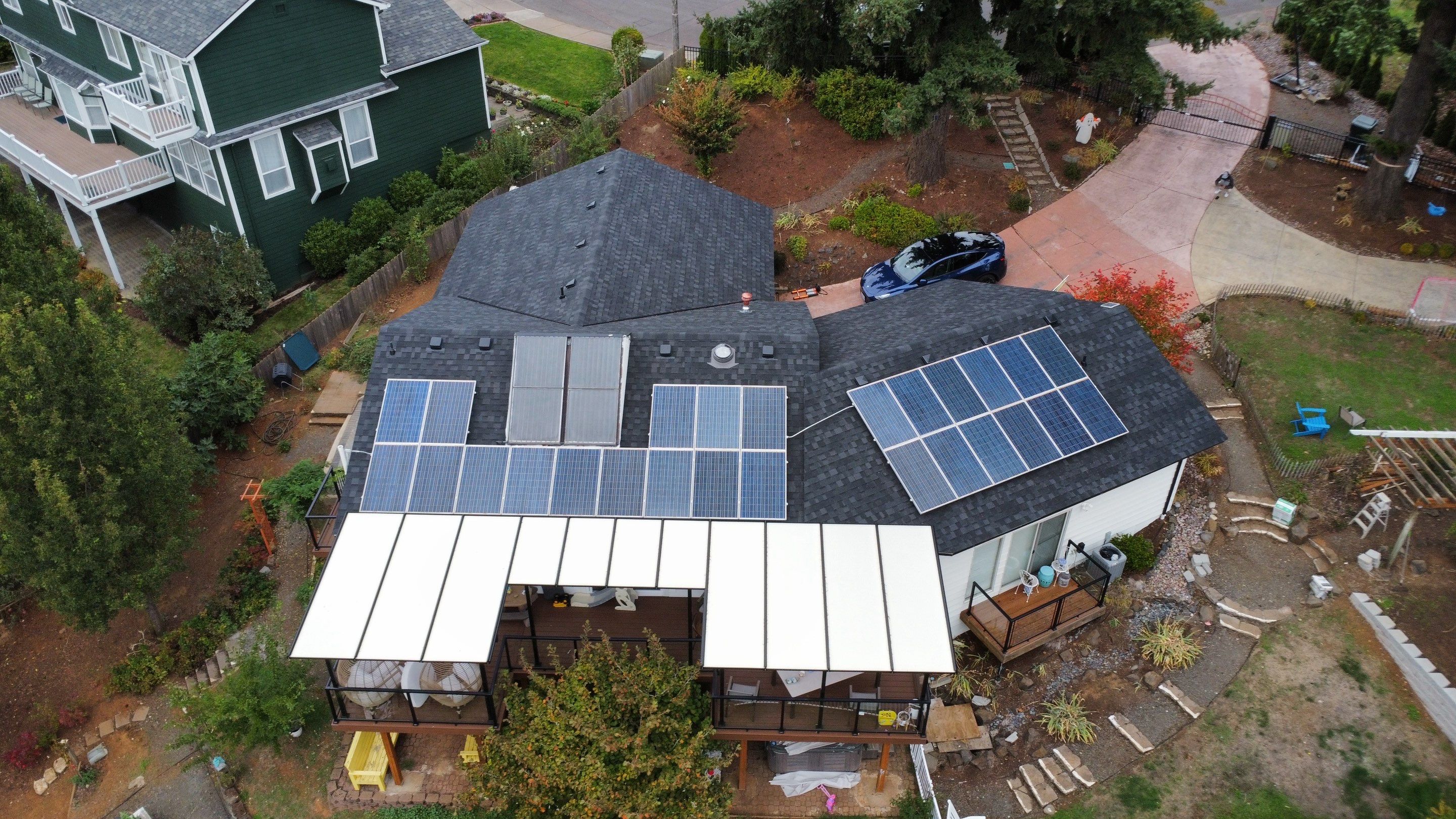Granite Black Residential Roof Replacement by Orezona Building & Roofing Company, Inc.