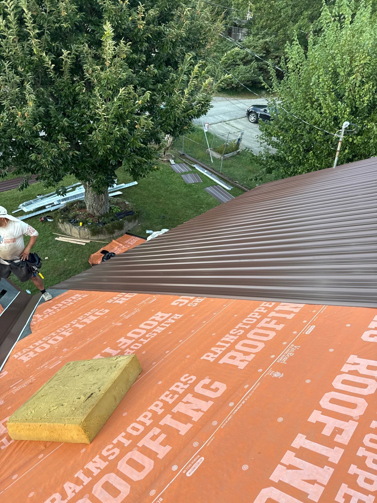 Residential Roofing Installation using Metal by Rainstoppers Roofing