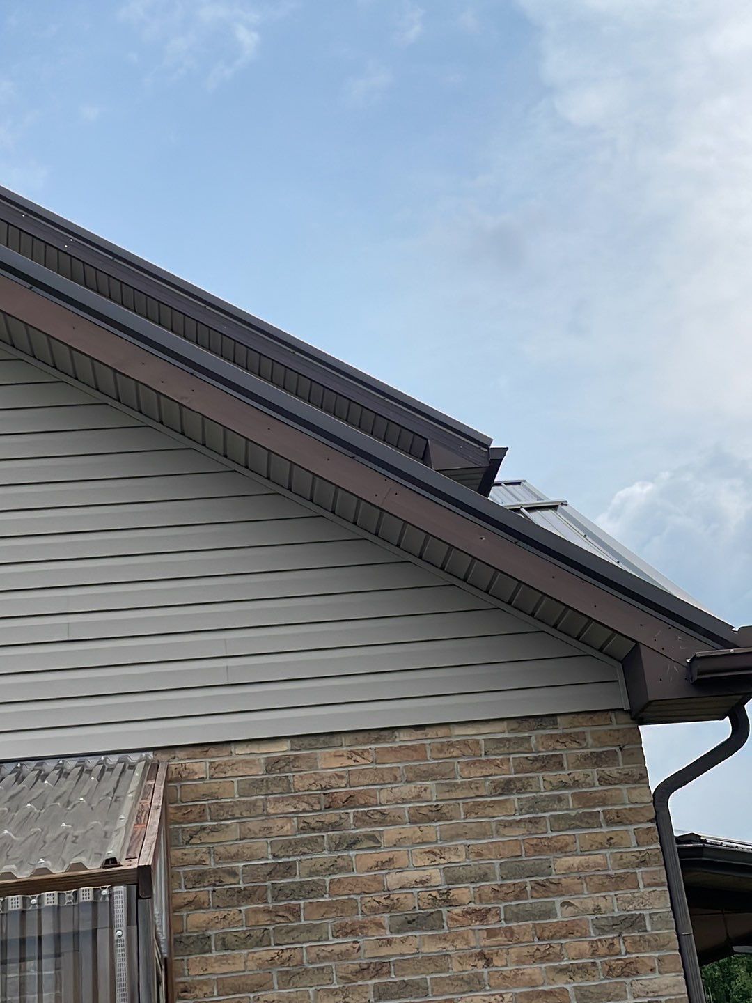 Residential Roofing Installation using Performance Panel Metal - Burnished Slate by RoofX 