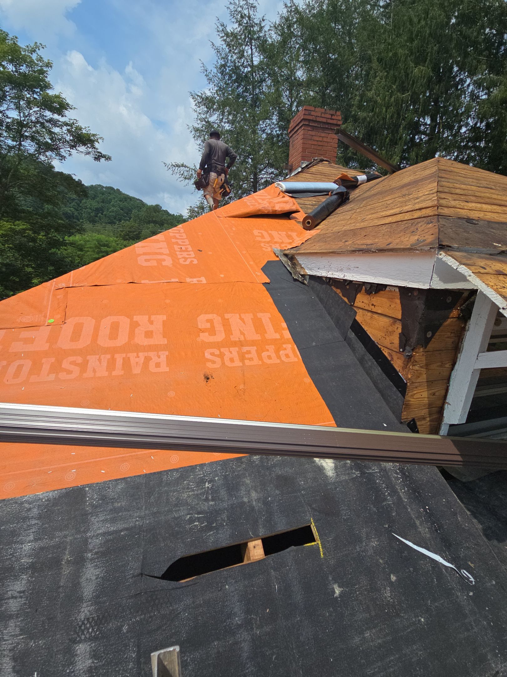 Residential Roofing Installation using GAF TImberline HDZ Hickory by Rainstoppers Roofing