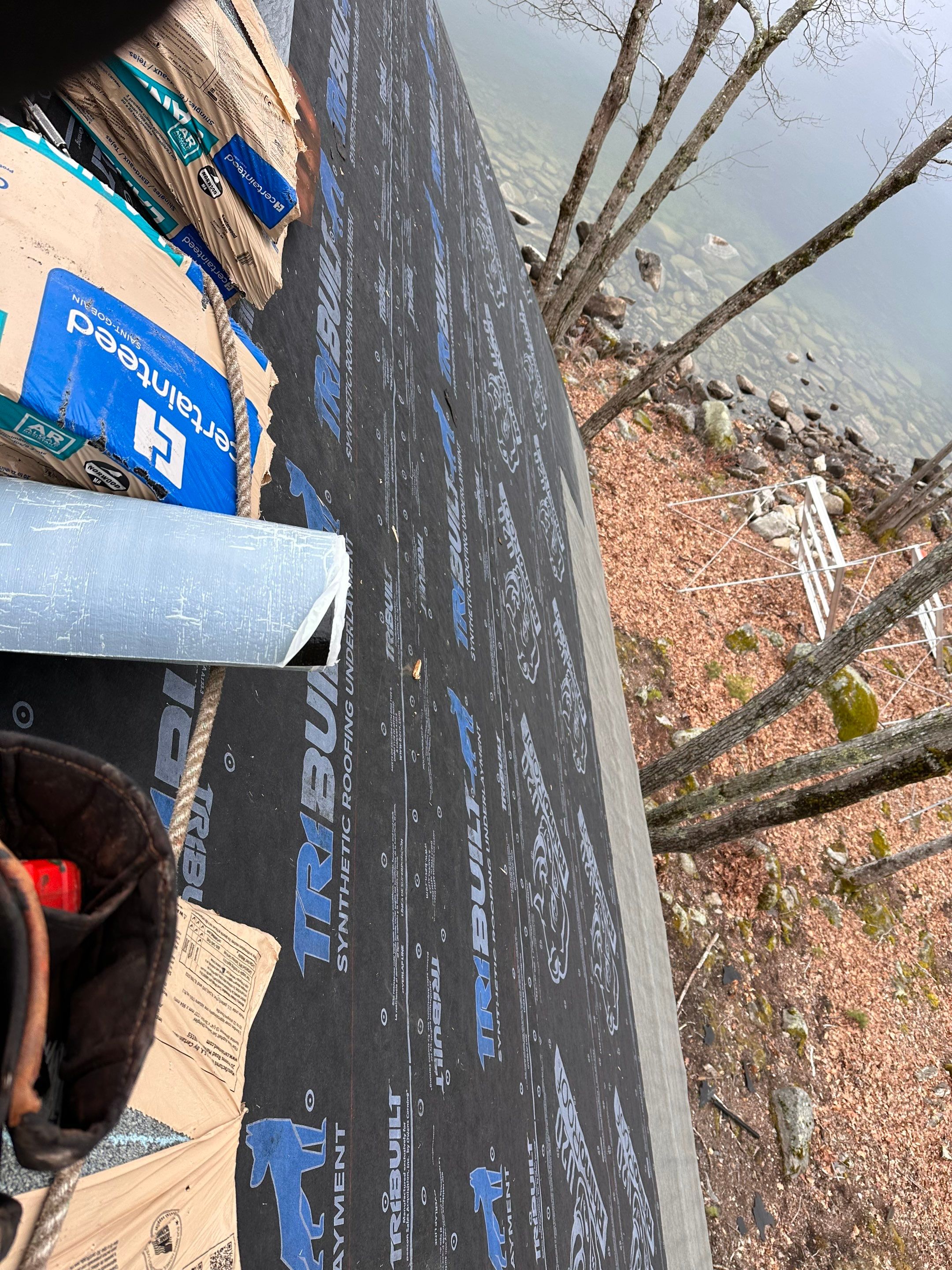 Asphalt Shingle Roof Replacement for Raymond Lakefront A-Frame Cabin by Tall pine roofing