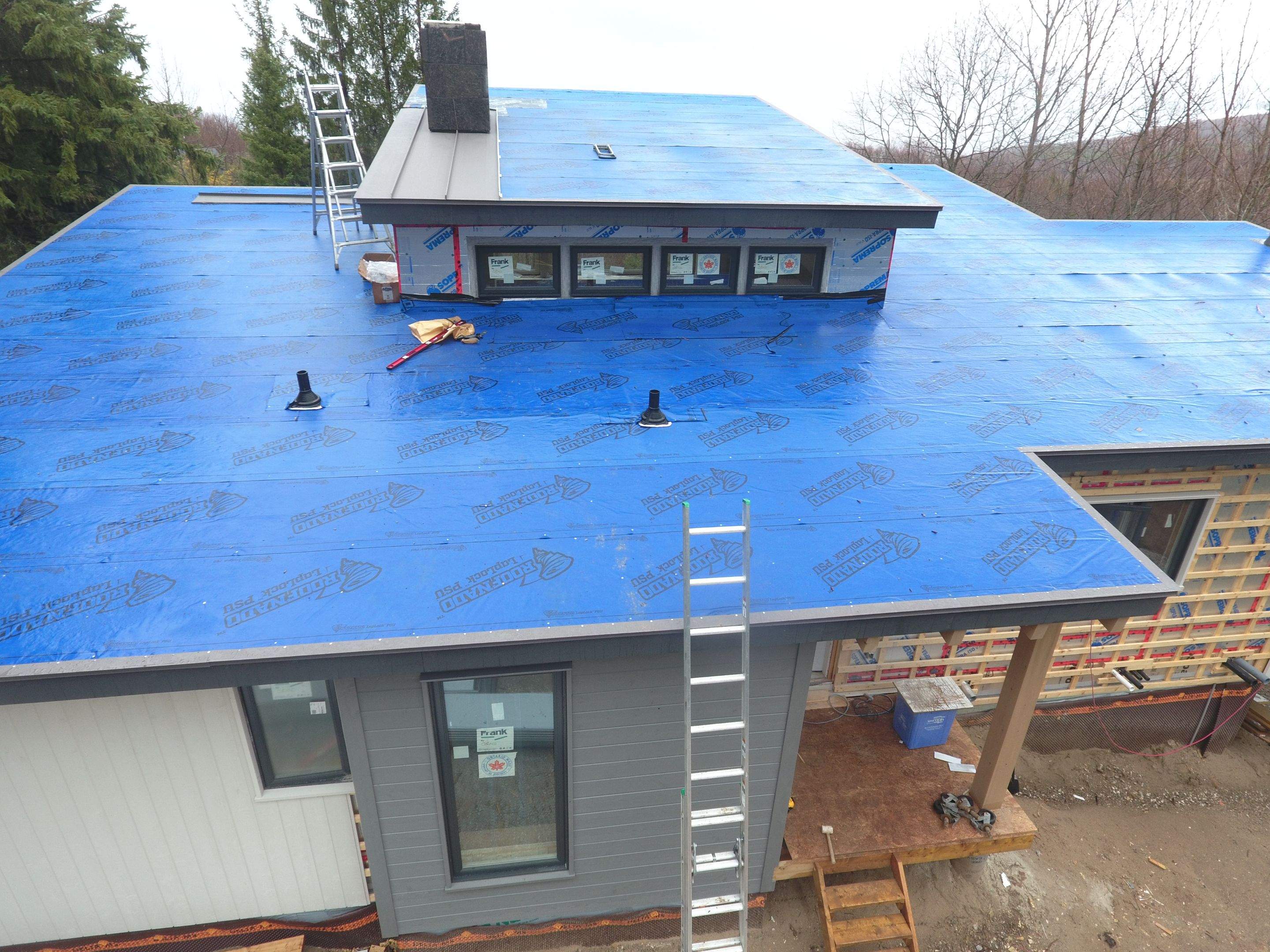 Residential Roofing Installation using 24 Ga Standing Seam Metal by Jay Carter Roofing & Sheet Metal