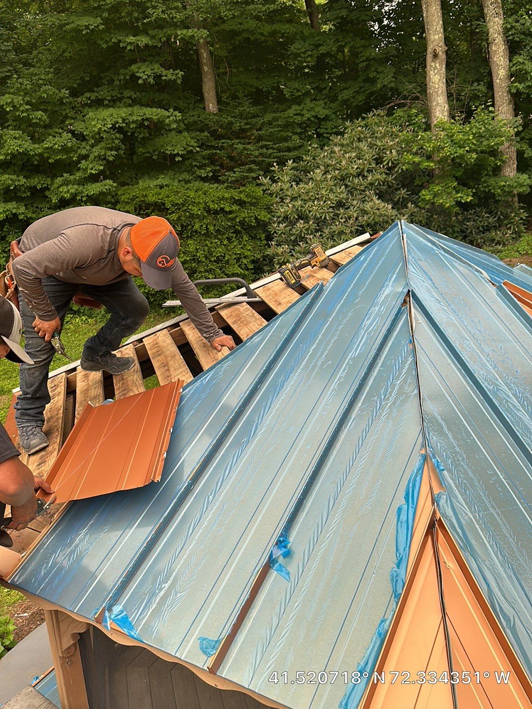 Residential Roofing Installation using Copper Penny Metal Roof by A Plus Exterior