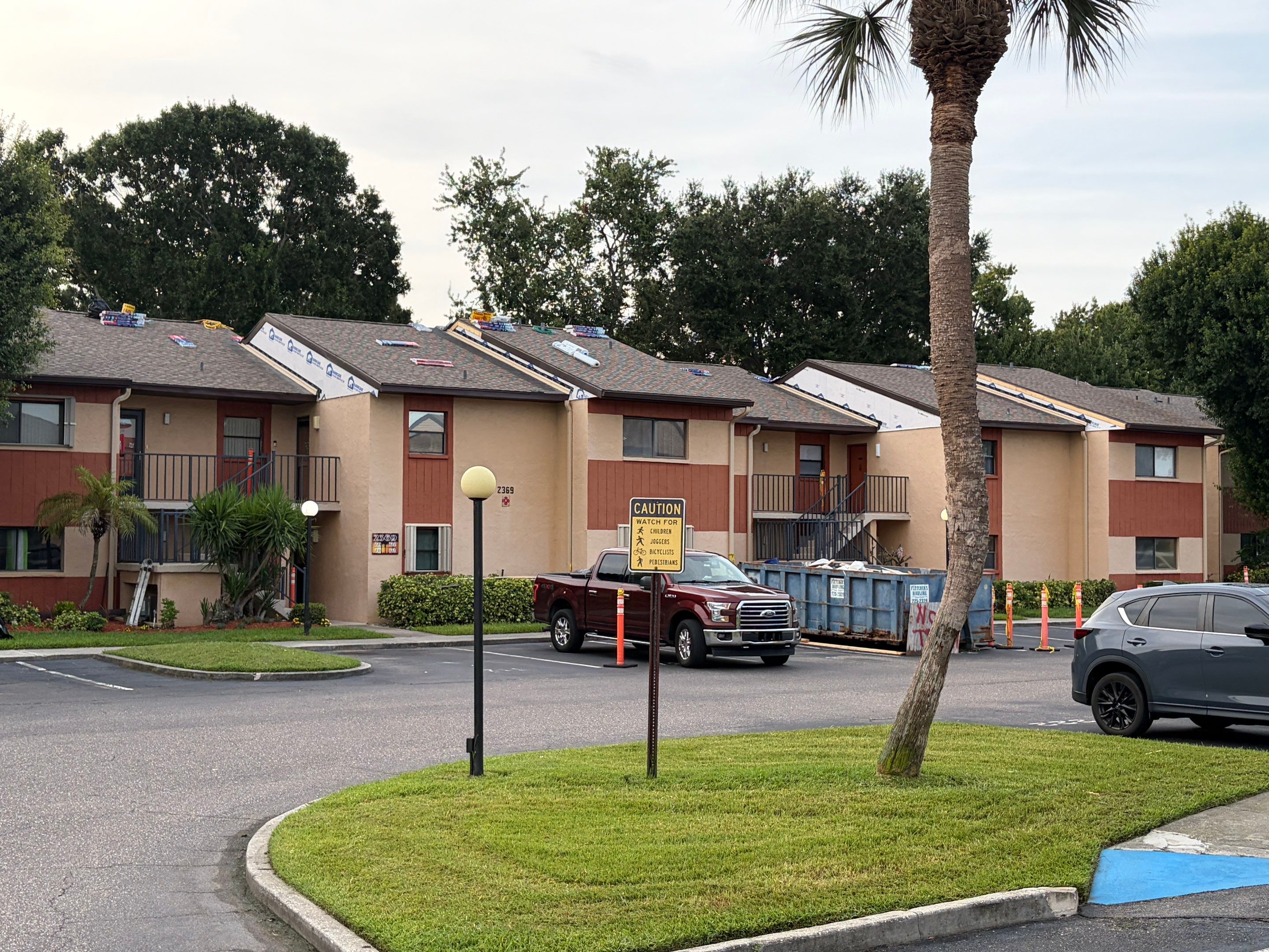 Multi-Family Roof Replacement and Siding Installation in Melbourne by Florida Roofing and Renovations Inc.