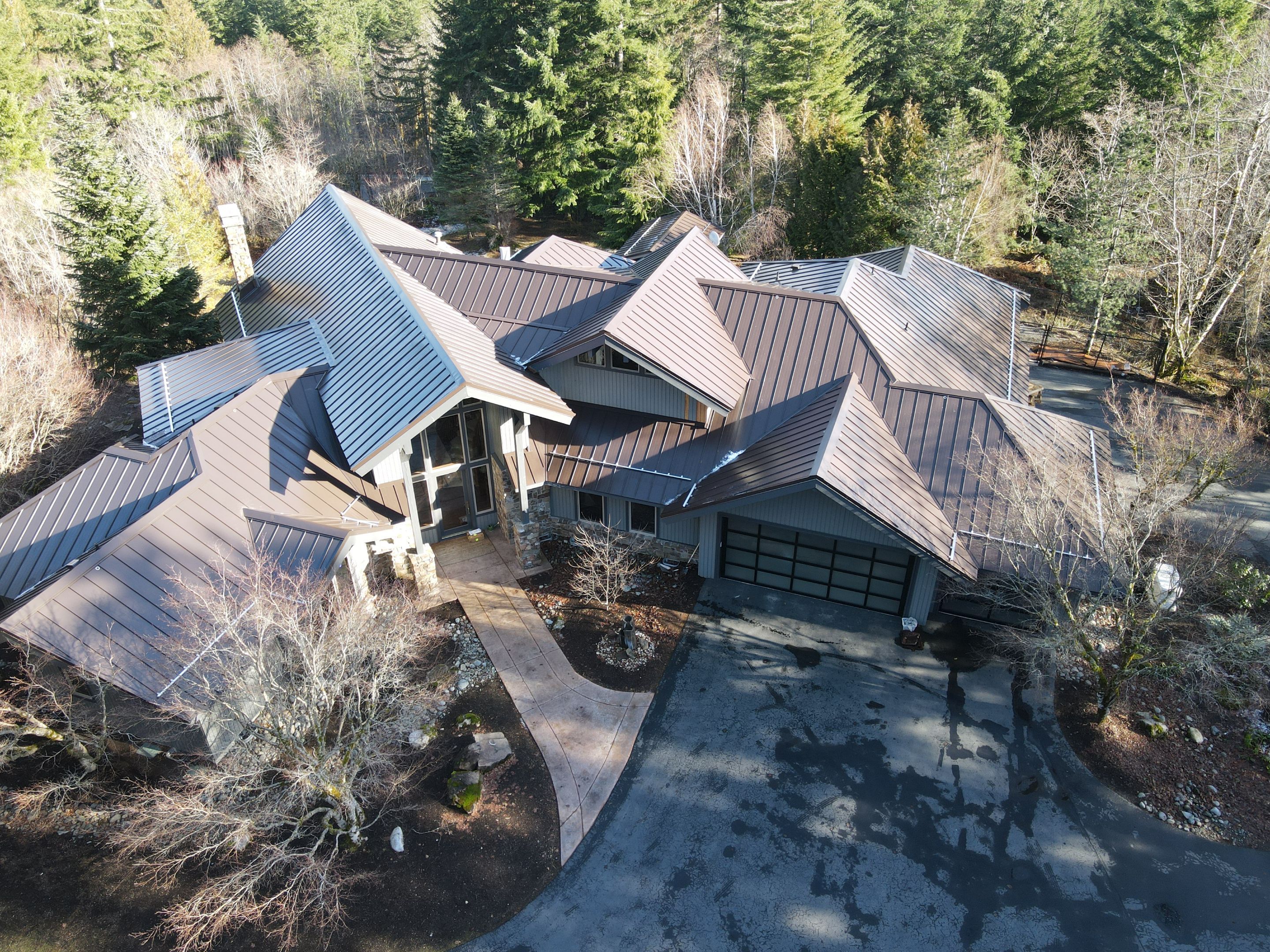 North Bend Roof Replacement using Standing Seam Metal - Dark Bronze by RoofSmart