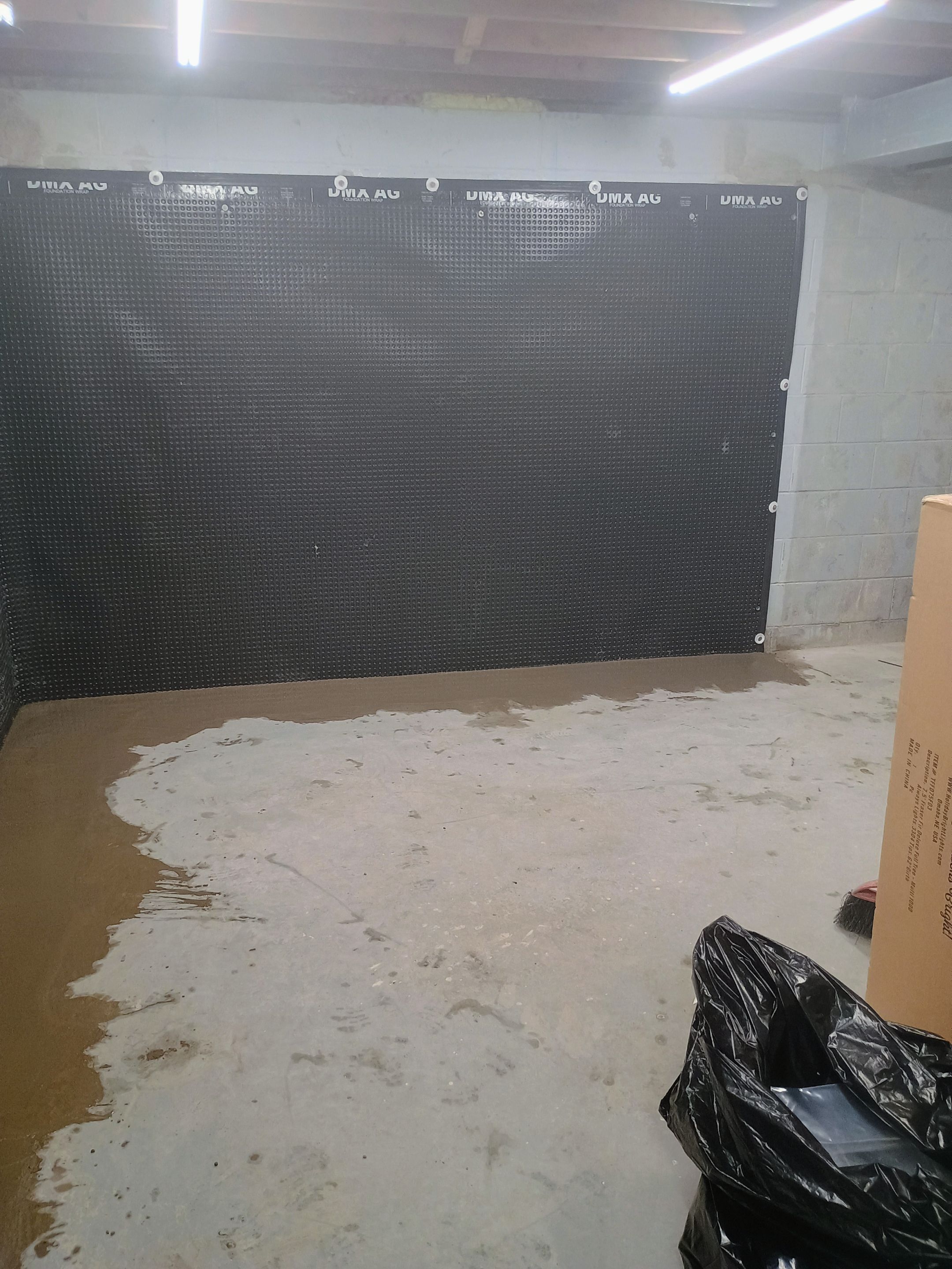 Depressurizing Denny's Basement Wall by Waterproofing Northeast