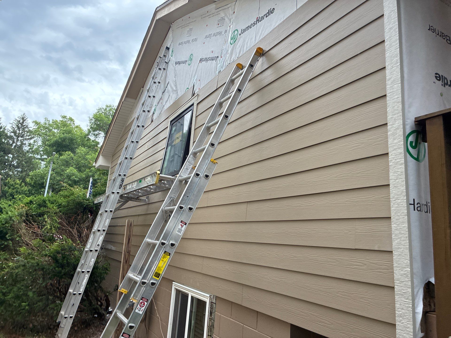 James Hardie Siding and Marvin Window Replacement in Bellevue by Carps Complete Exteriors 
