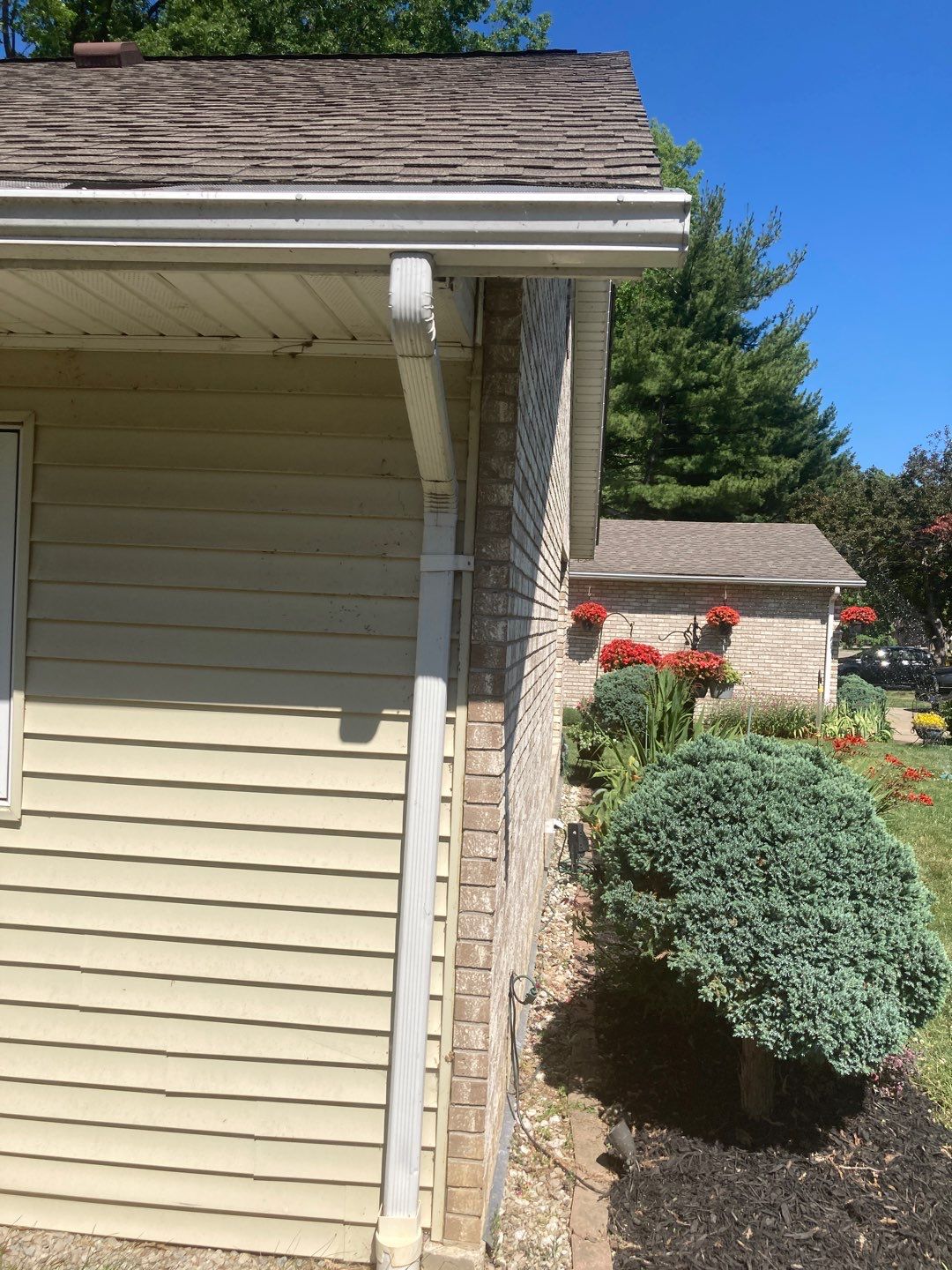 Gutter Installation using 5" Seamless Aluminum Gutters by Absolute Roofing and Construction