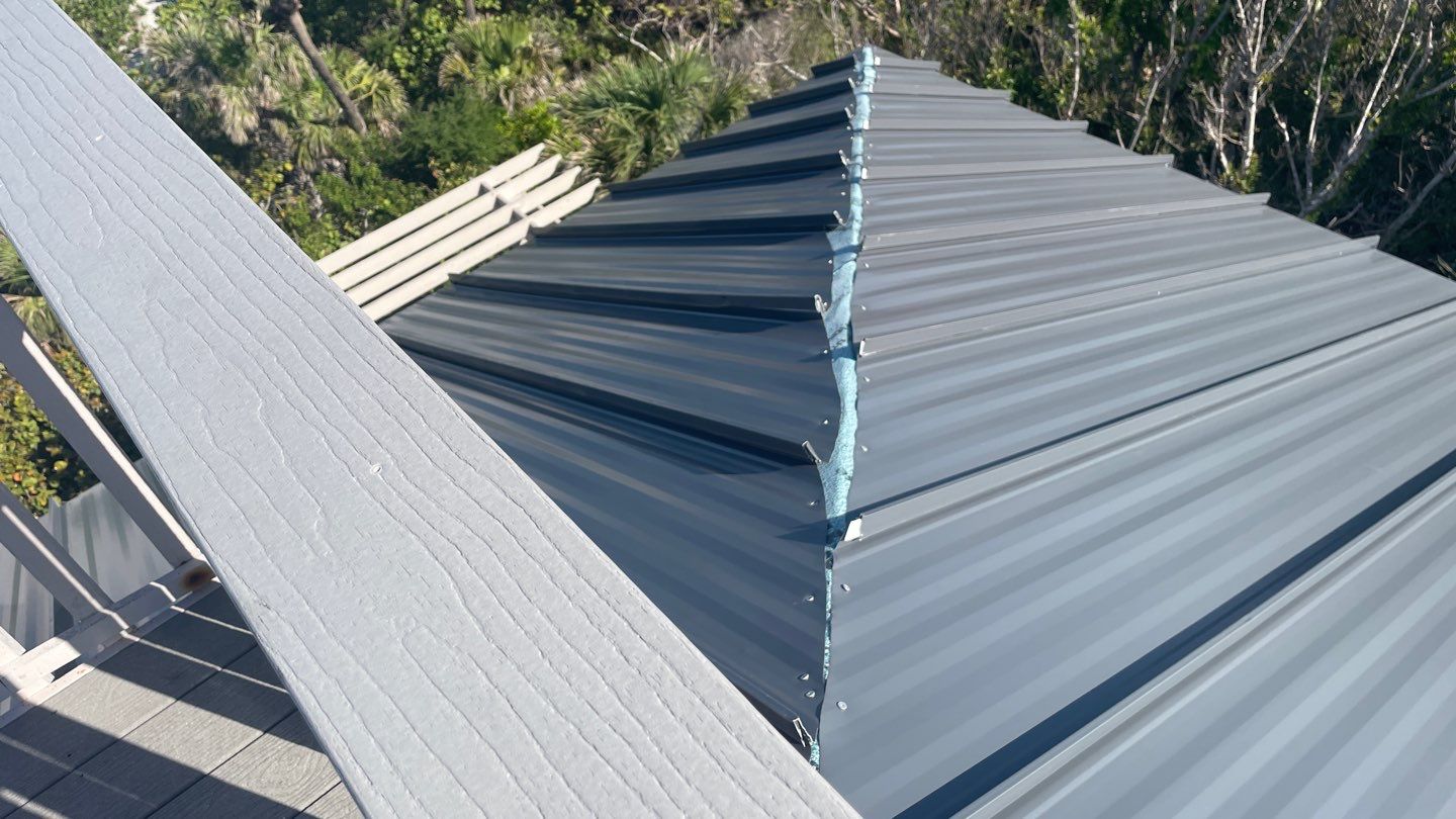 Residential Roofing Installation using Gulf Coast Metals Gulf Seam Panels by Four Peaks Roofing