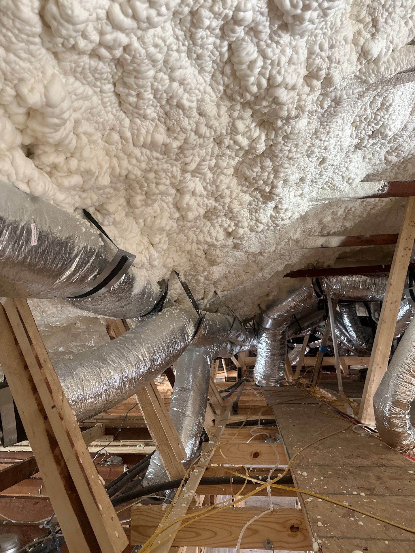 Open cell spray foam & rockwool job completed in Dallas TX by Apex Insulation Solutions