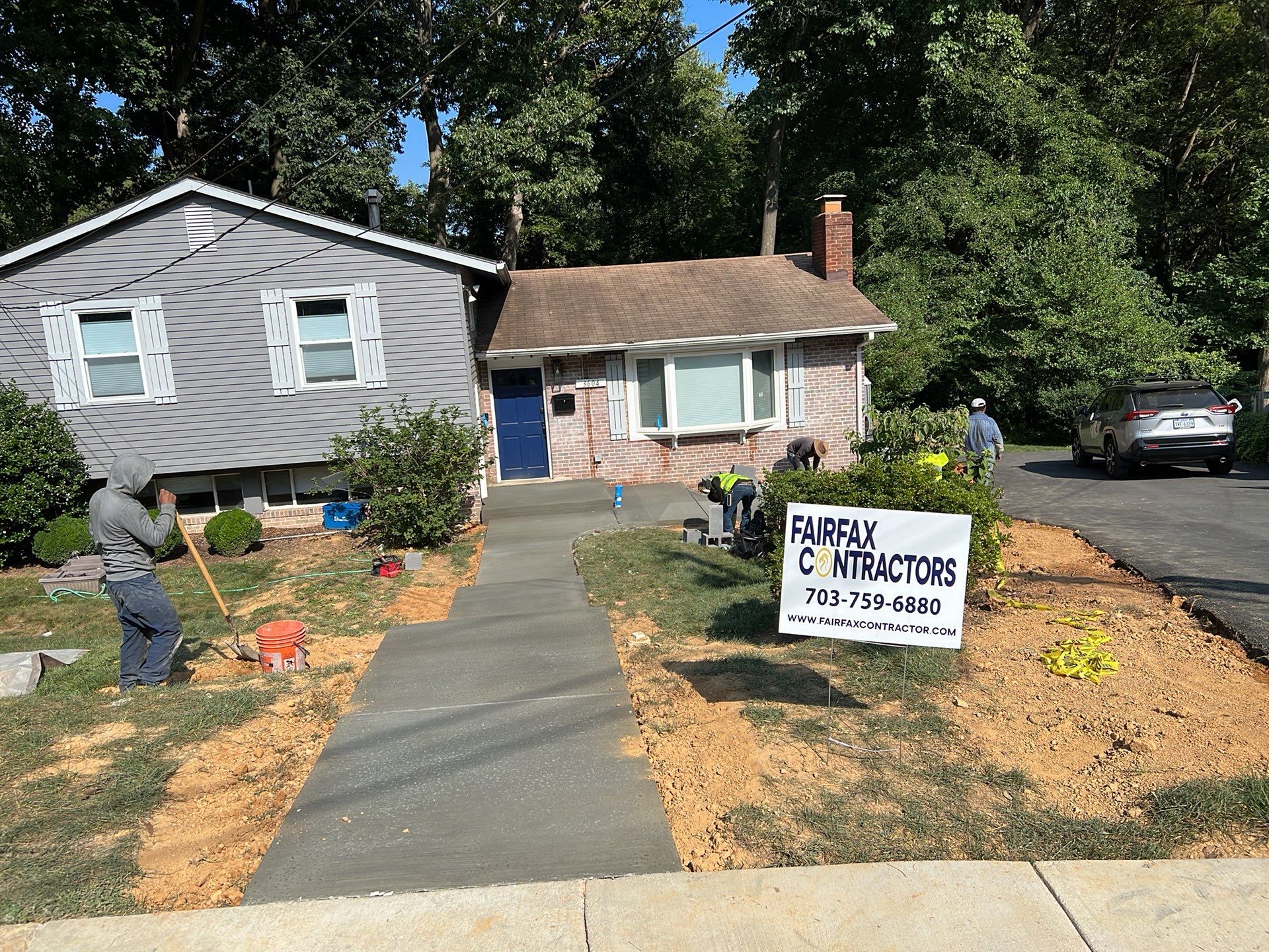 New walkway with stairs and a new front porch by Fairfax Contractors, LLC