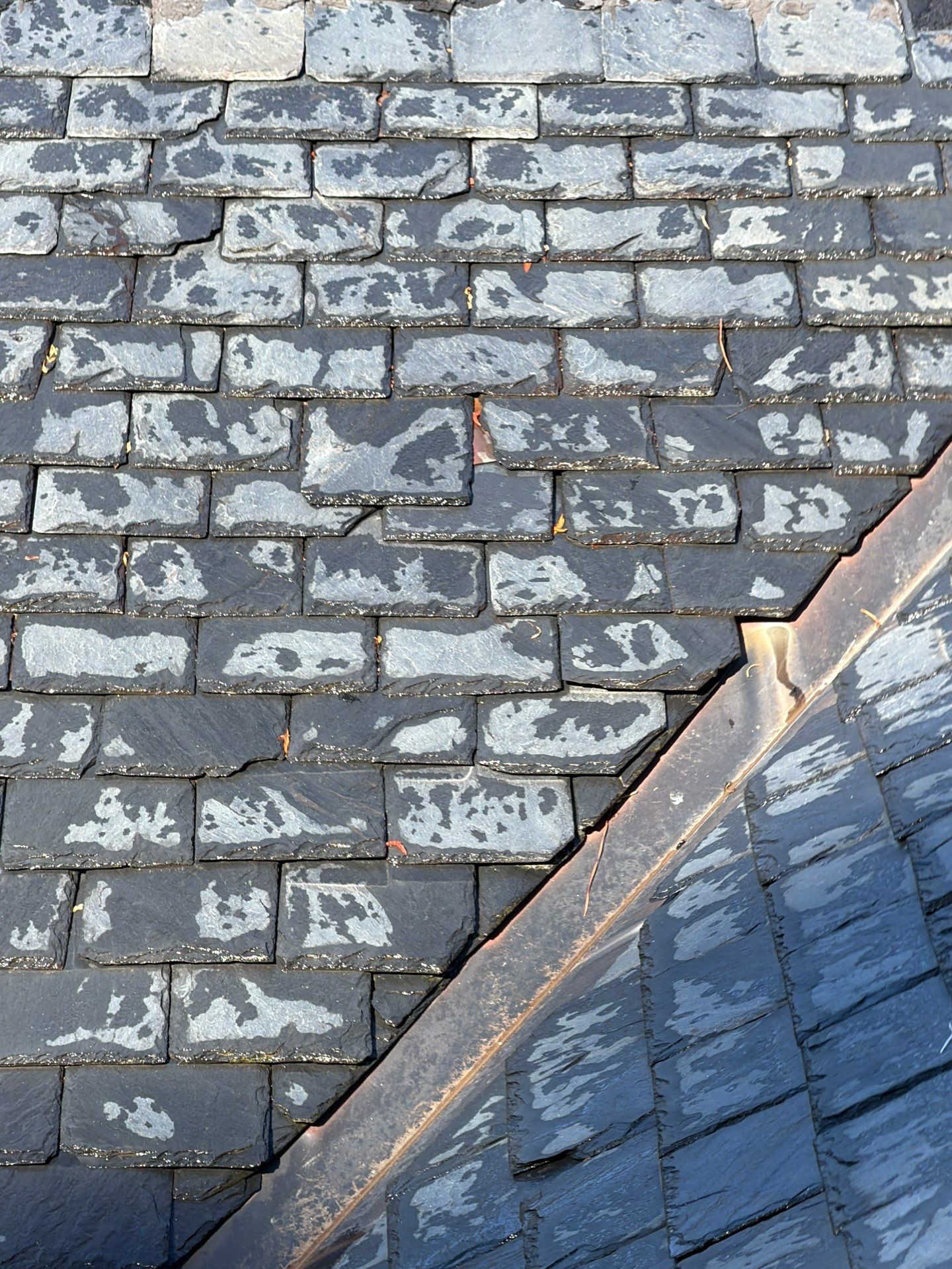 Historical Slate Roof Repair and Chimney Flashing Restoration in West Point by Cade Construction