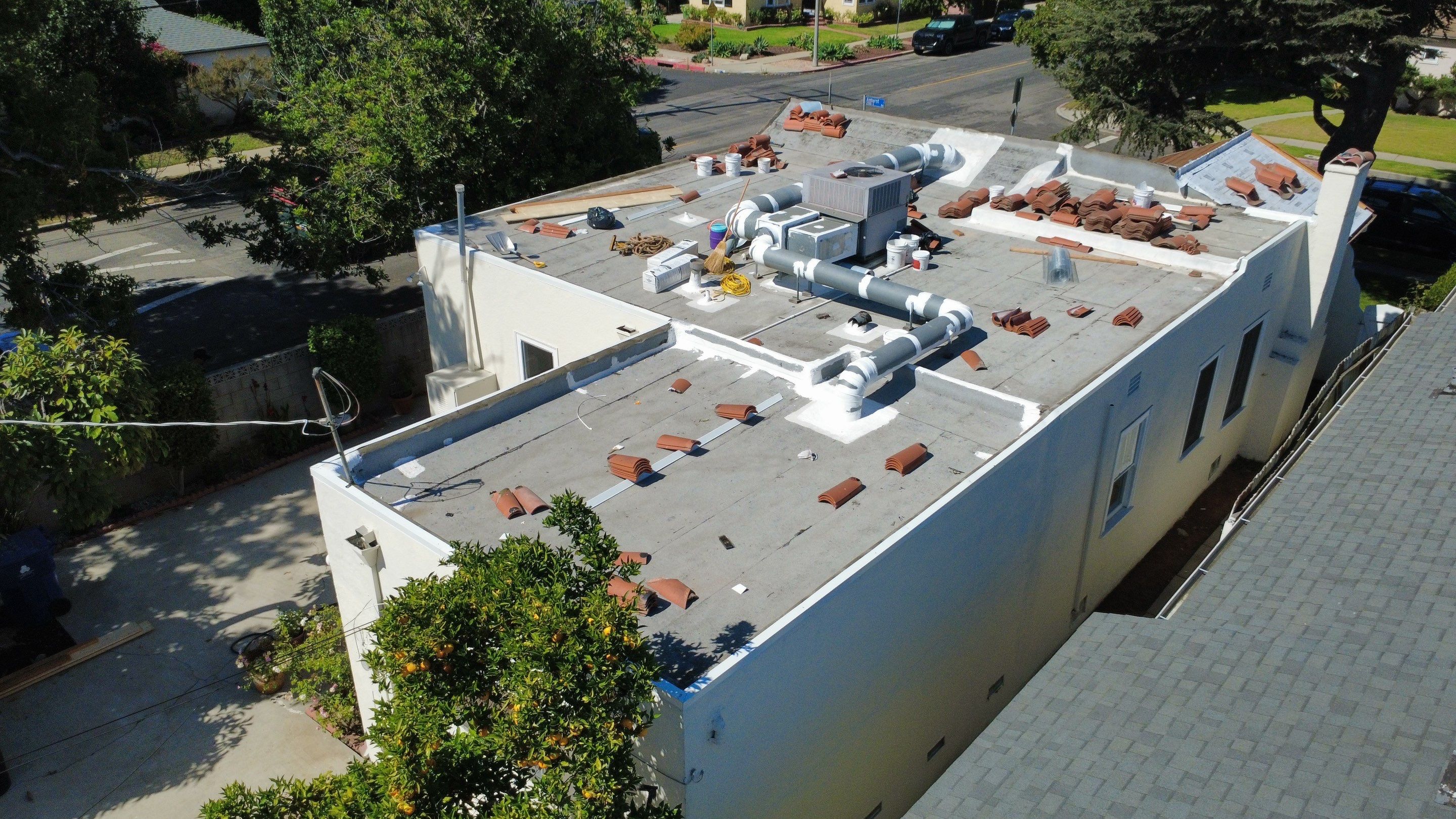 Tile Reset and Silicone Membrane Installation by Hull Brothers Roofing
