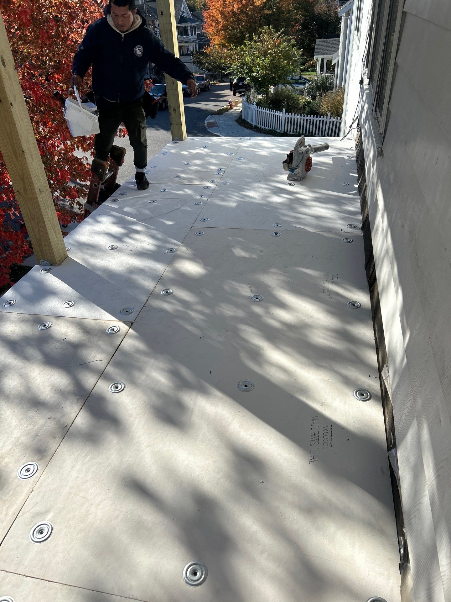 Watertown Porch EPDM Rubber Roof Installation by Mighty Dog Roofing of Greater Middlesex County