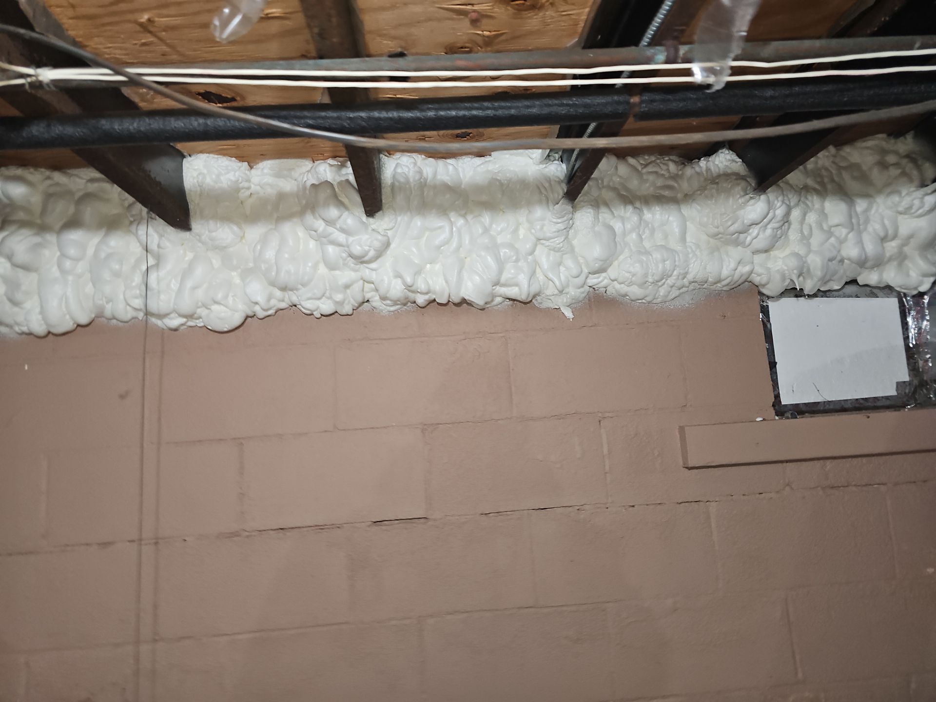 Attic Insulation using open cell spray foam by NYS Foam & Energy