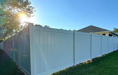 Vinyl Fence Installation using 6Ft White Vinyl Privacy Fence