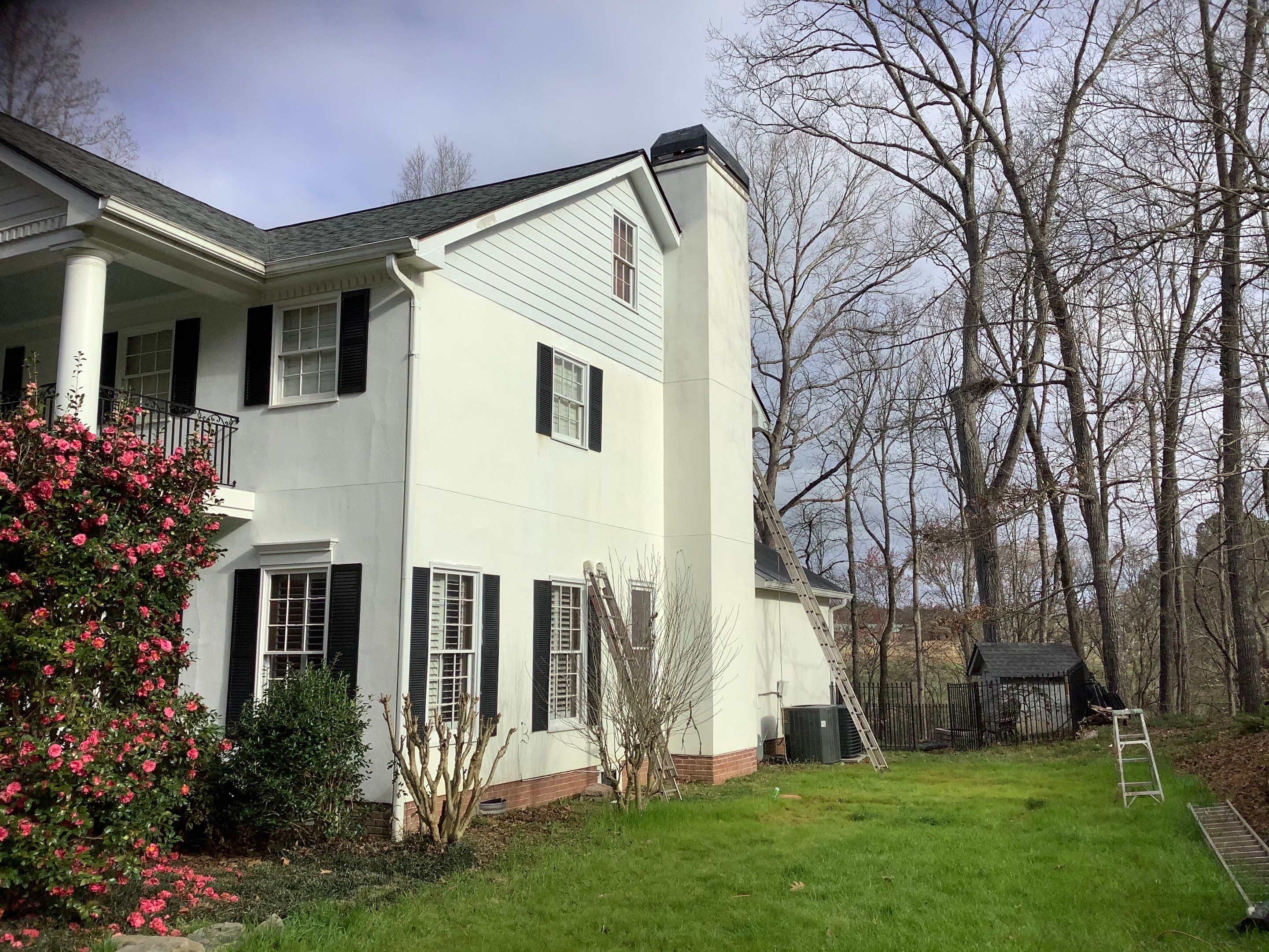 Full Exterior Repaint for Colonial Style Home in Cumming by Swift Home Renovations