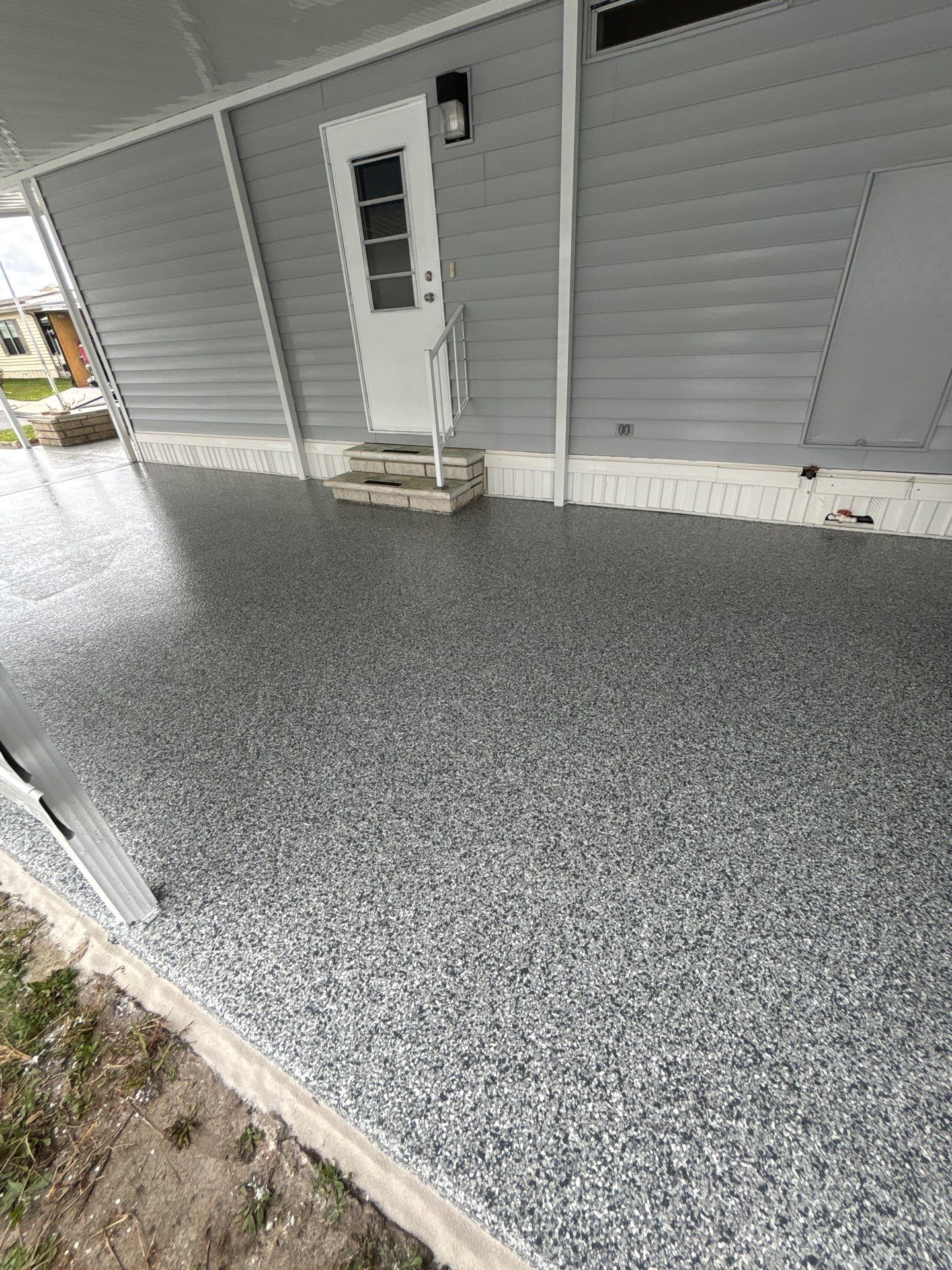Driveway Floor Coating Using Gravel Flake by Performance Floors & Coating
