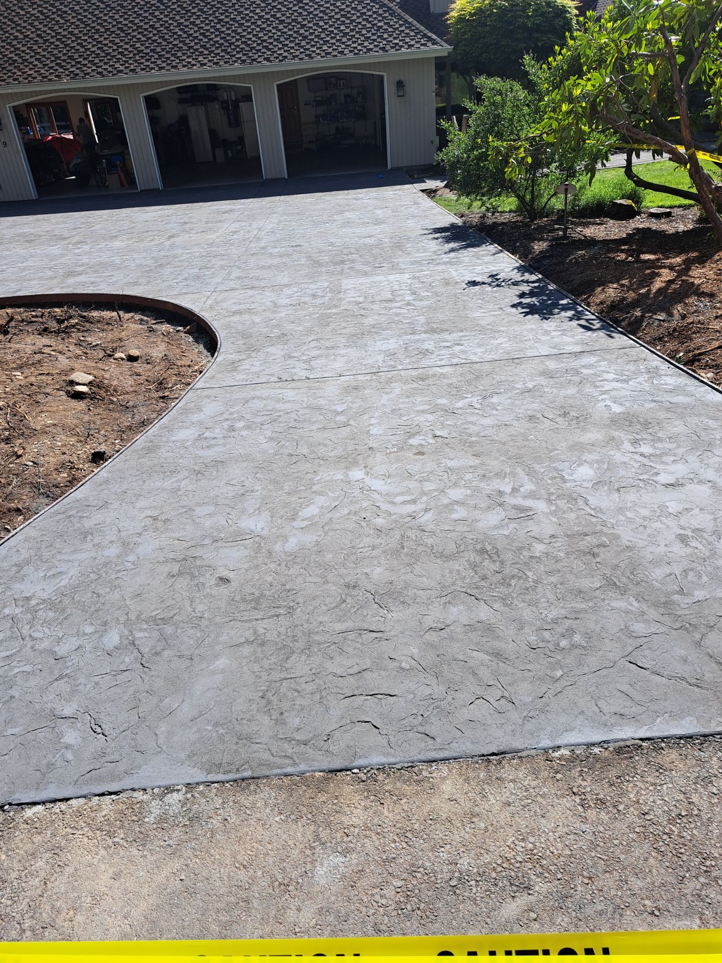 Stamped Concrete Driveway Renovation | Woodinville  by Jireh Asphalt & Concrete Inc 