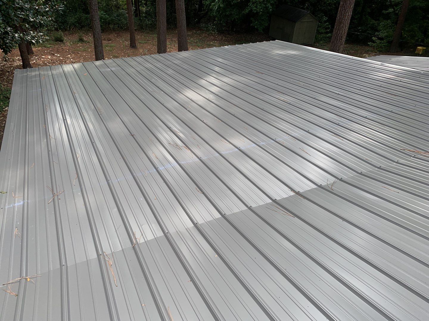 Re Roof (metal roofing) by American Roofing NC