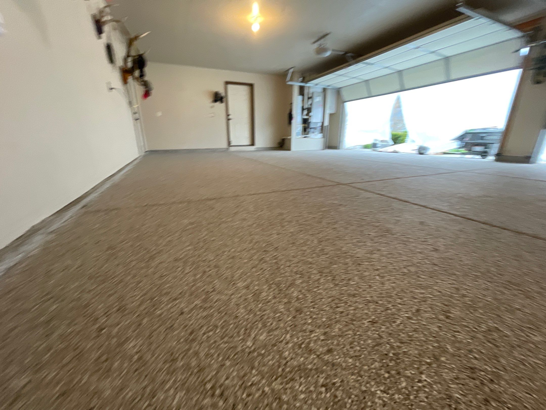 Garage Transformation using Pebble Beach and Front Porch using Greystone by Croc Coatings, LLC