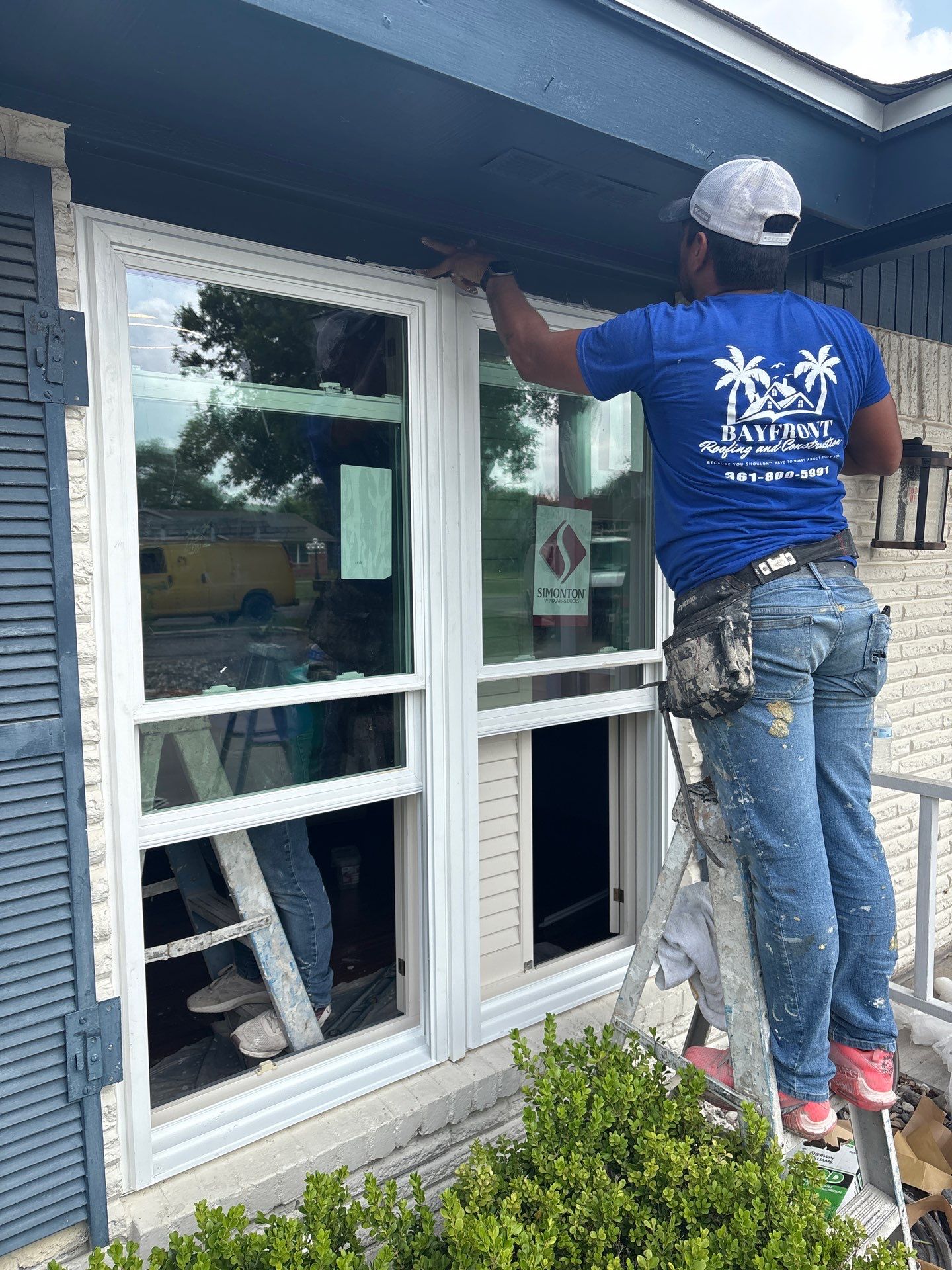 Installing Windows on a Submarine  by Bayfront Roofing and Construction
