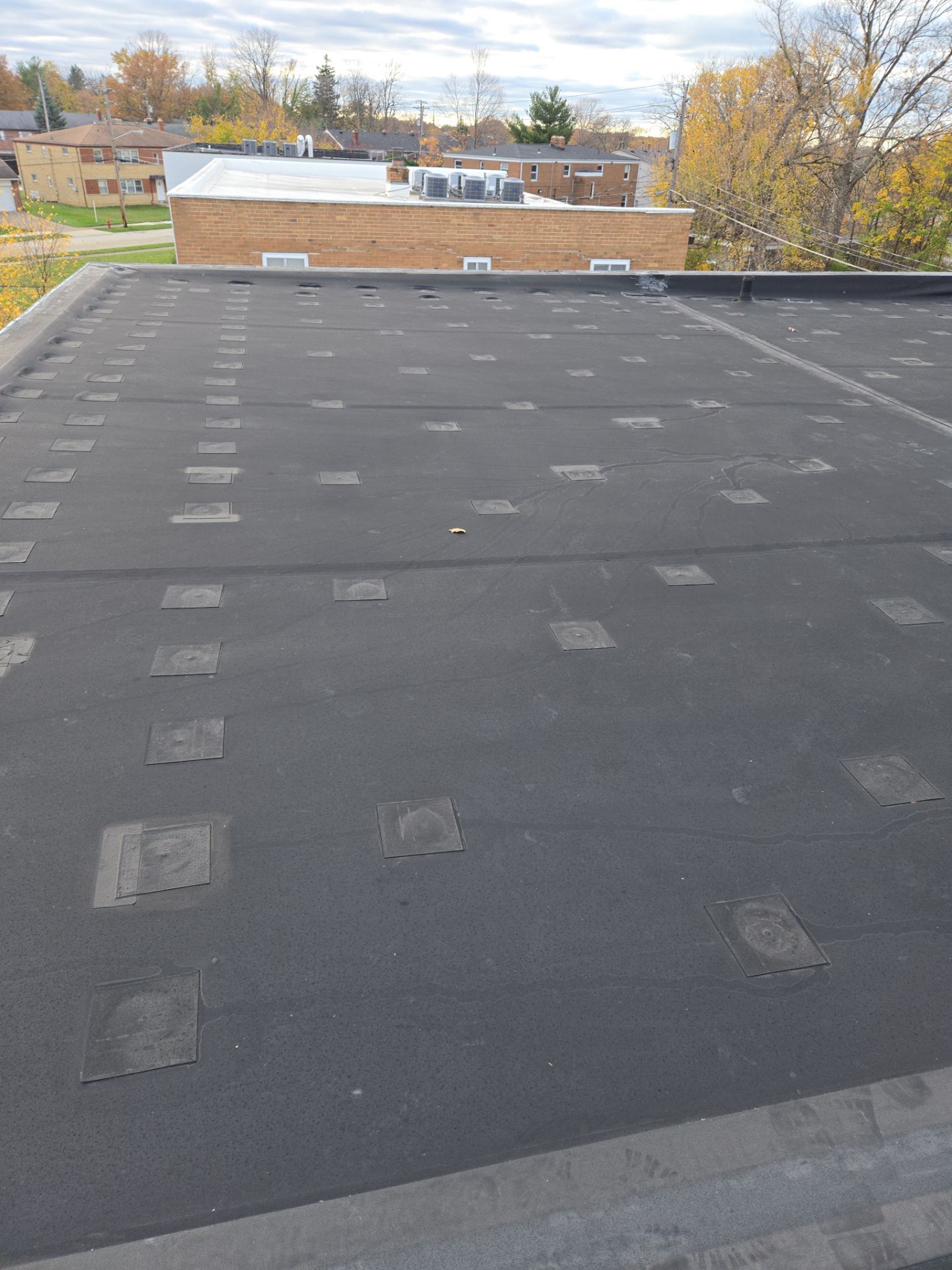 Commercial Roofing Installation using Duro-Last 50 mil PVC by 3 Daughters Construction 