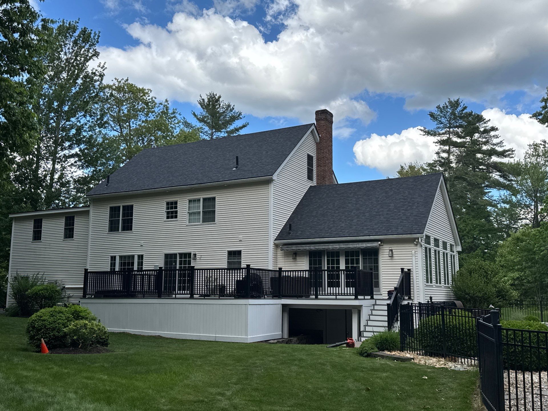 Roof Replacement on Cobbetts Pond in Windham, NH with Owens Corning Onyx Black Shingles by Compass exteriors