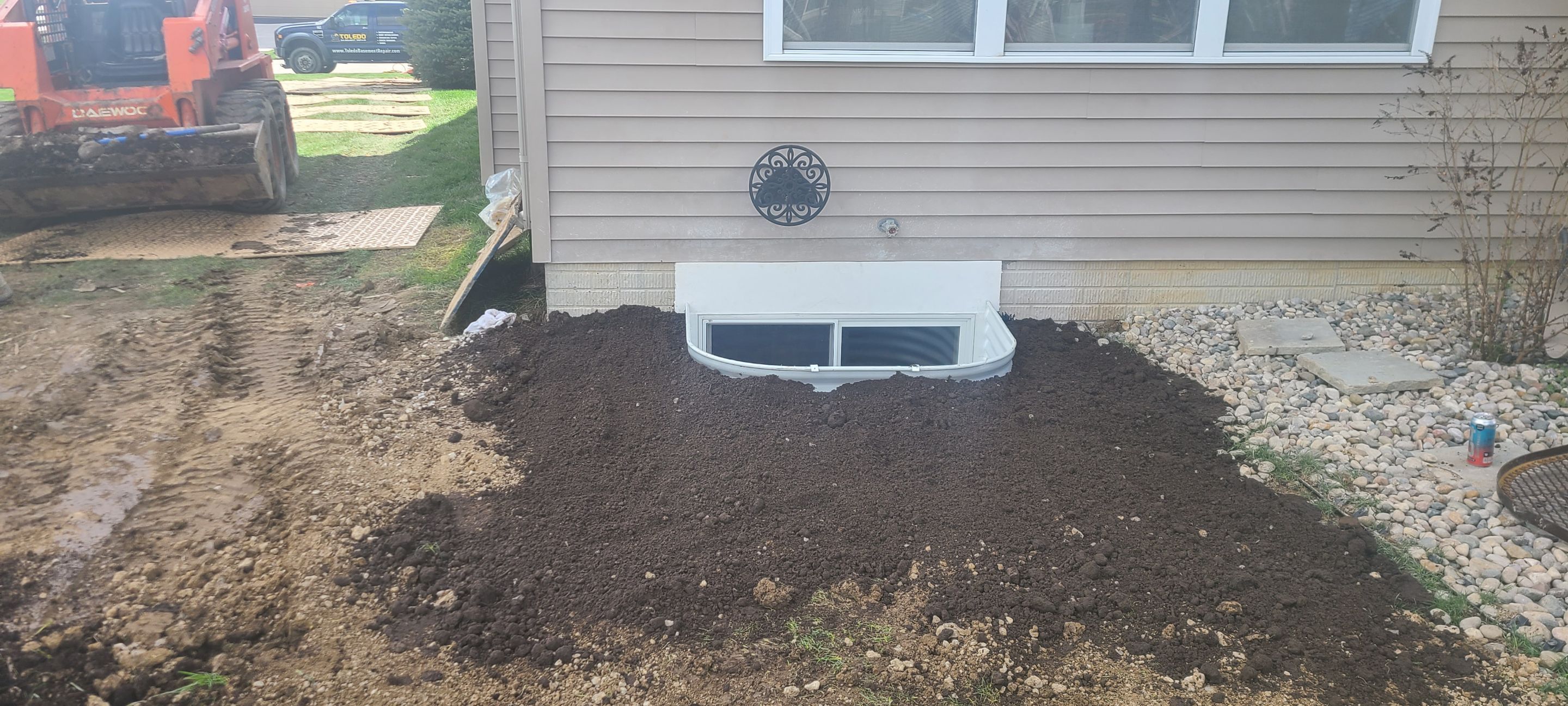 While Steel Egress Window Installation by Toledo Basement Repair