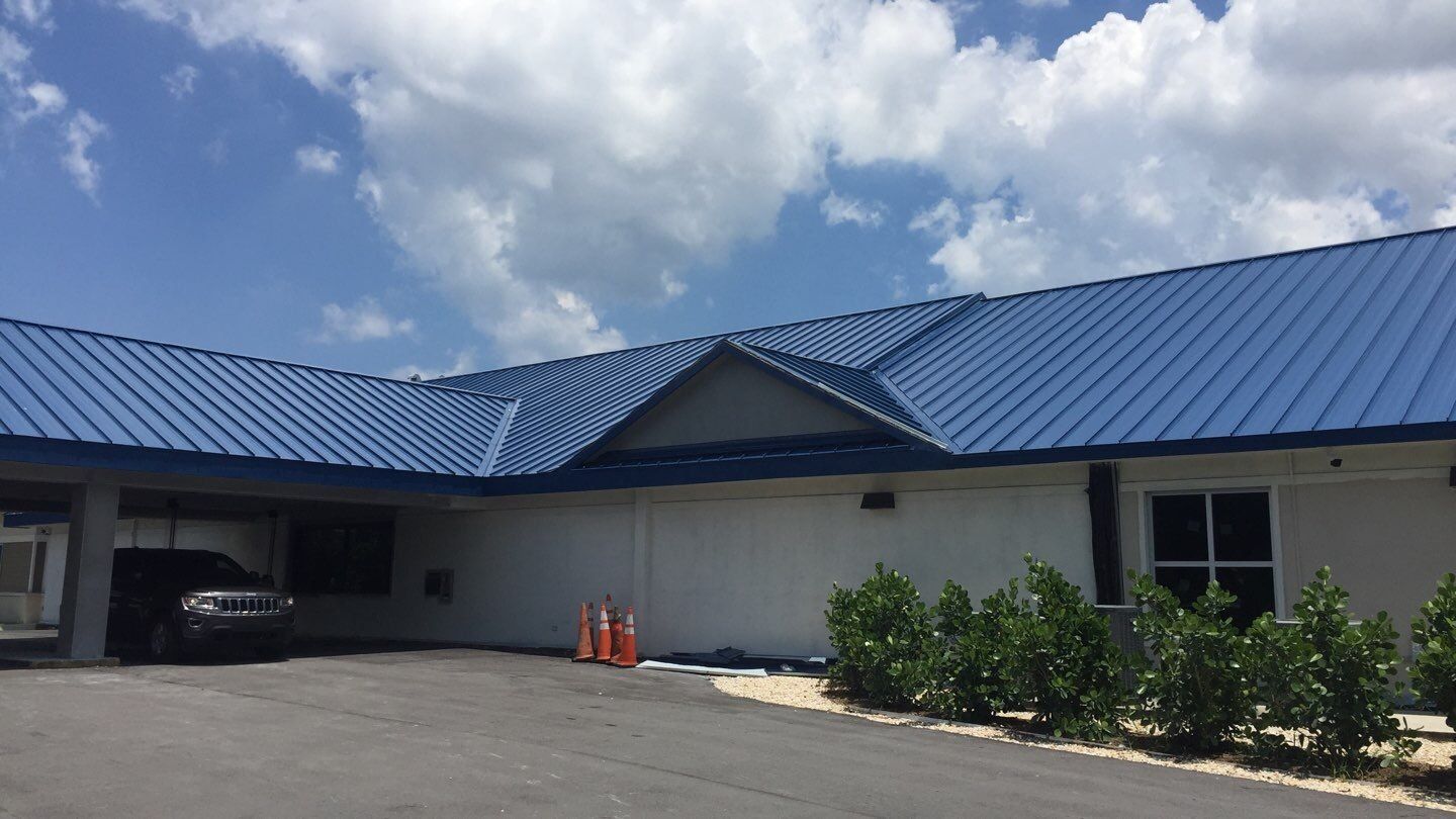 Residential Roofing Installation using 1.5'' Mechanical Seam by BLUES BROTHERS ROOFING