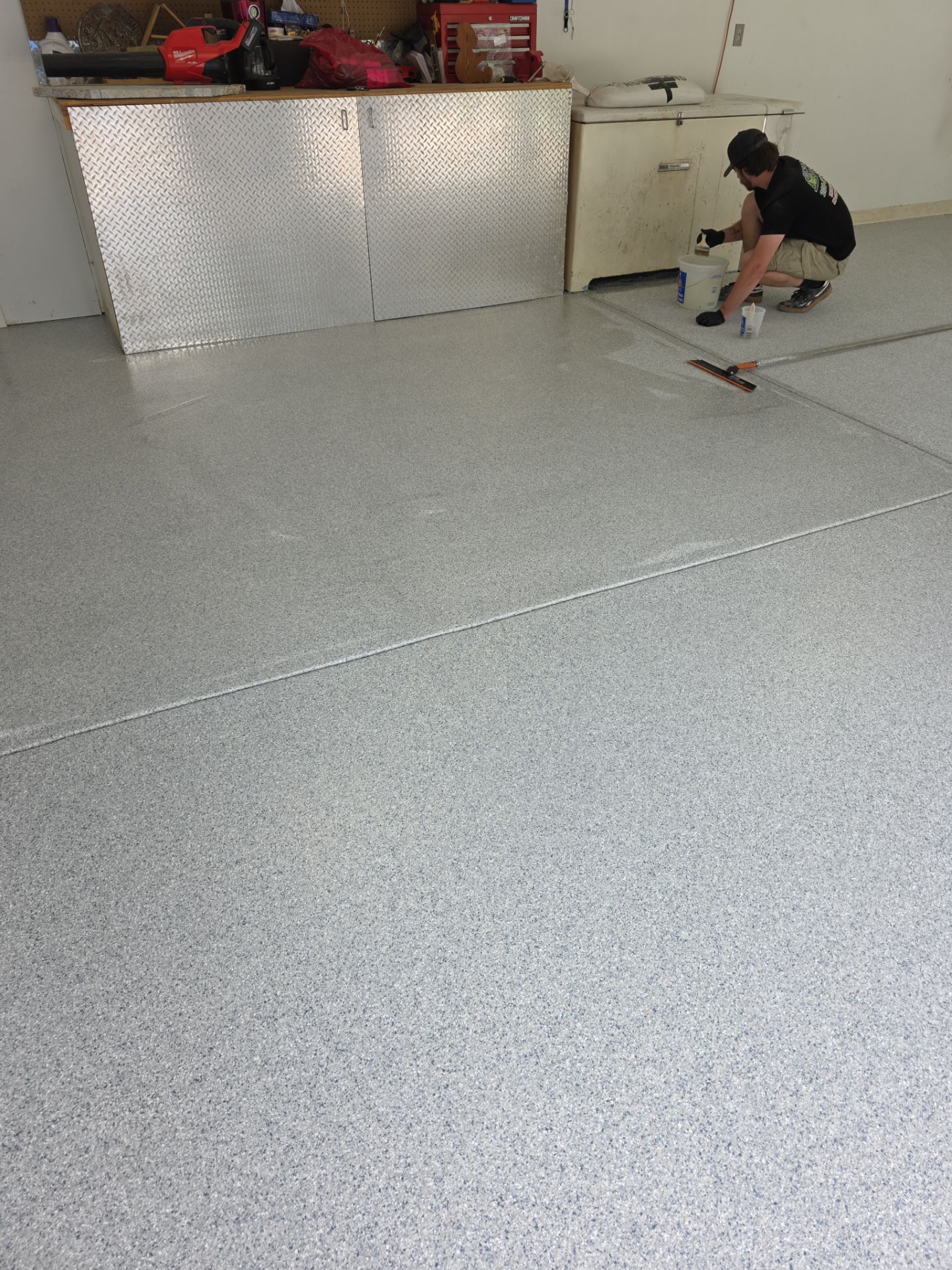 Garage Transformation using 1/8 Tidal Wave by Croc Coatings, LLC