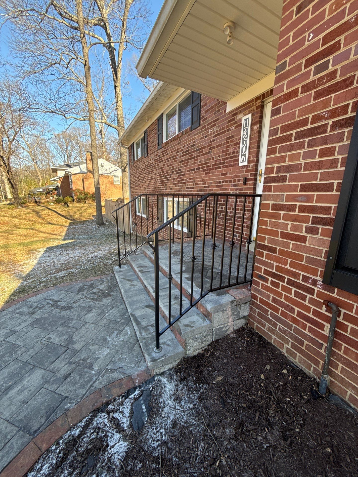 Custom Exterior Iron Railing with Ornamental Detail by Capitol Iron Works