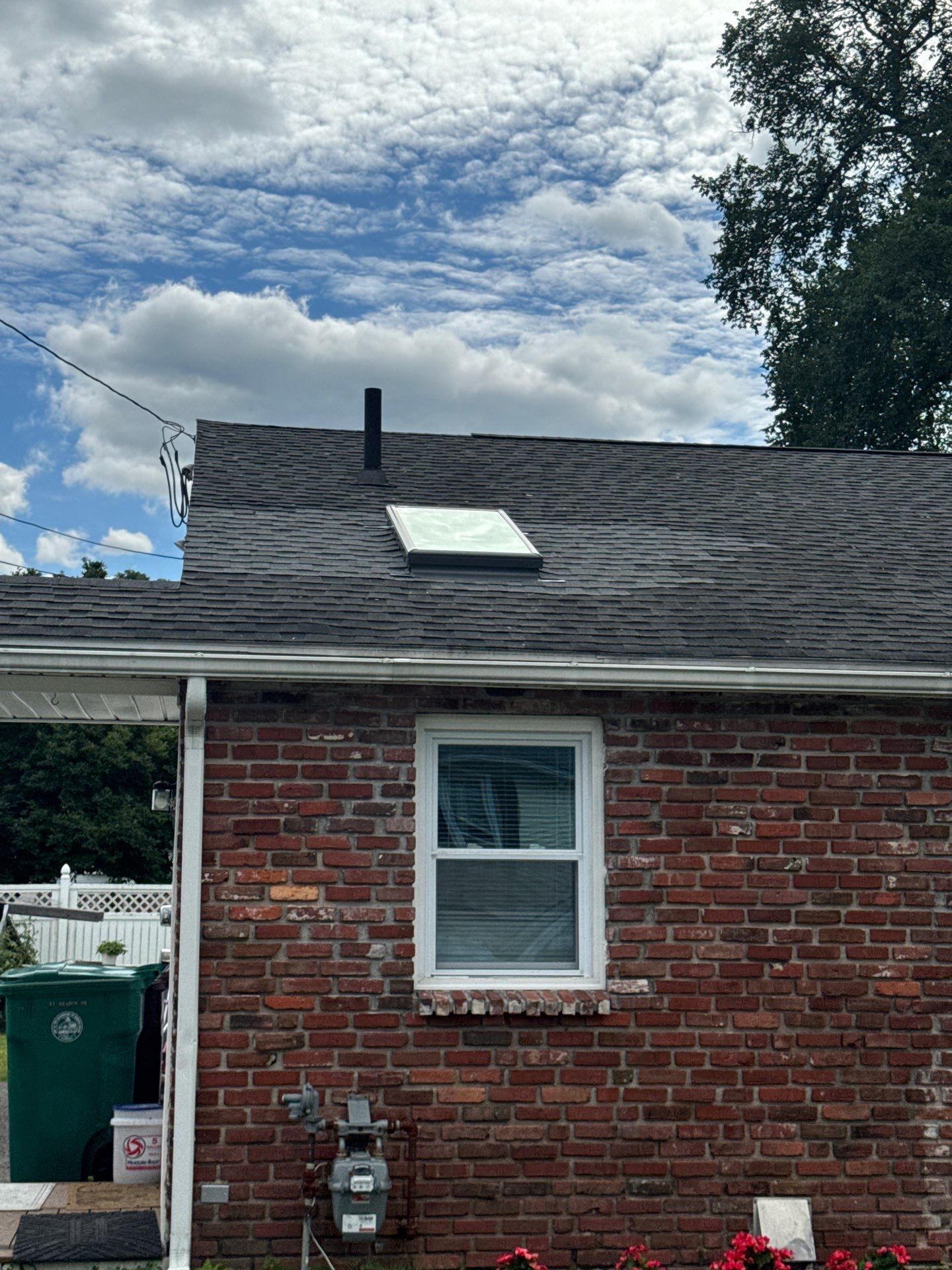 Lowell Premium Velux Curb-Mount Skylight & Chimney Restoration by Mighty Dog Roofing of Greater Middlesex County