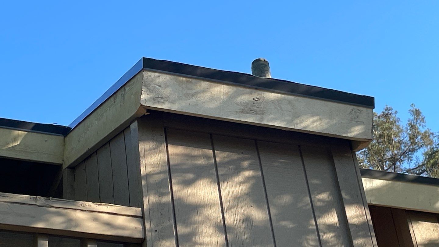 Removed tile from roof and replaced with shingles by Straight Edge Roofing Inc