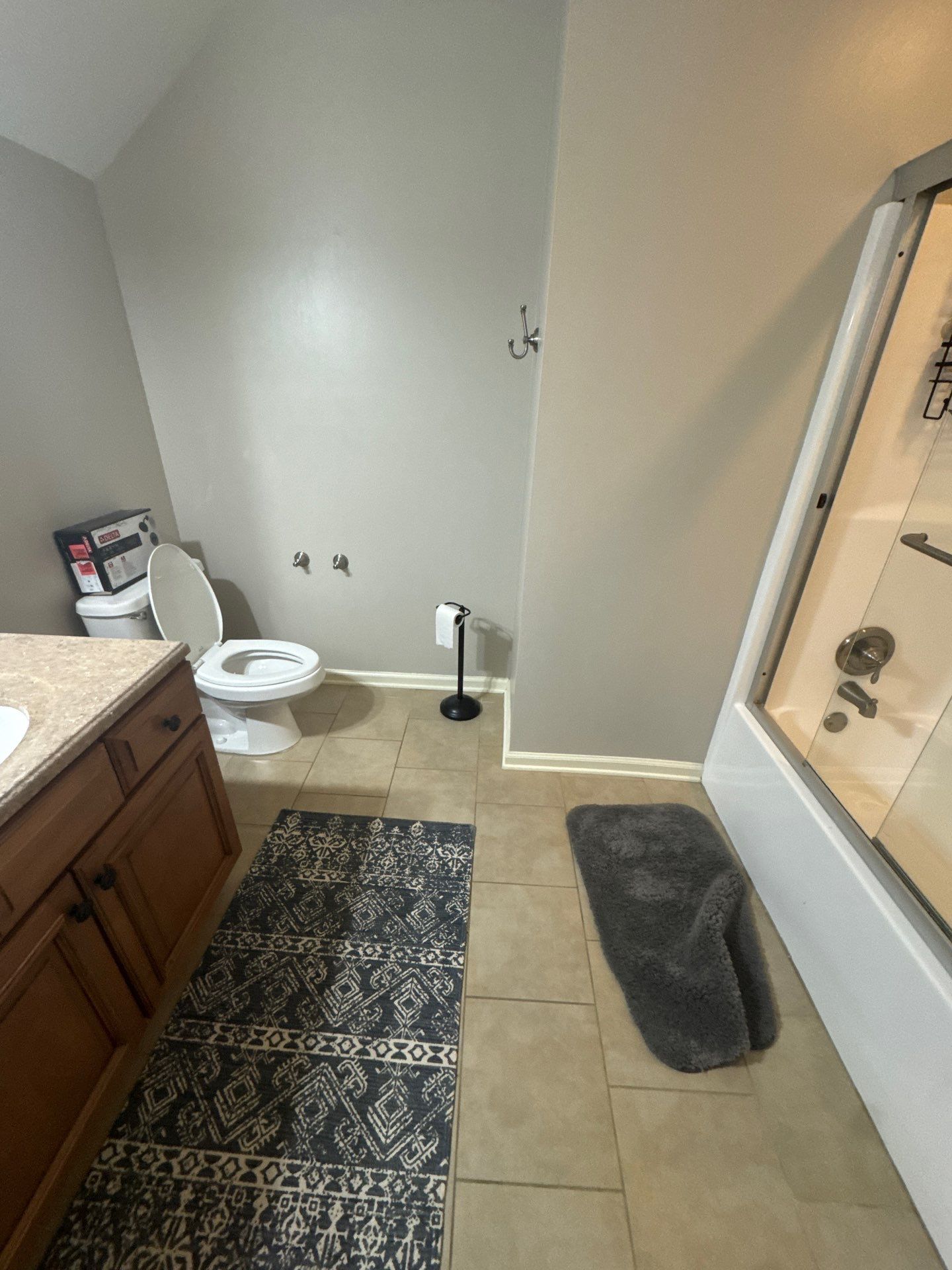 Modern Bathroom Transformation With Marble Patterned Tile in Powder Springs by Swift Home Renovations