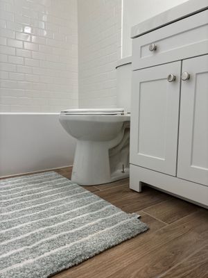 Bathroom Remodel using Sherwin Williams Premium ceiling paint by Laser Focused Solutions LLC