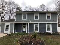 Siding Installation using JH Batten Smooth and JH Select Cedarmill Eased Edge by ExteriorPros